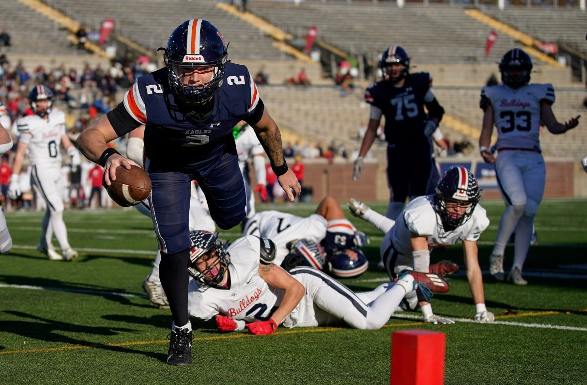 Nashville Christian's Jared Curtis (2) runs in a touchdown against Columbia Academy during the first quarter of the Division II-A championship game at Finley Stadium in Chattanooga, Tenn., Thursday, Dec. 5, 2024.