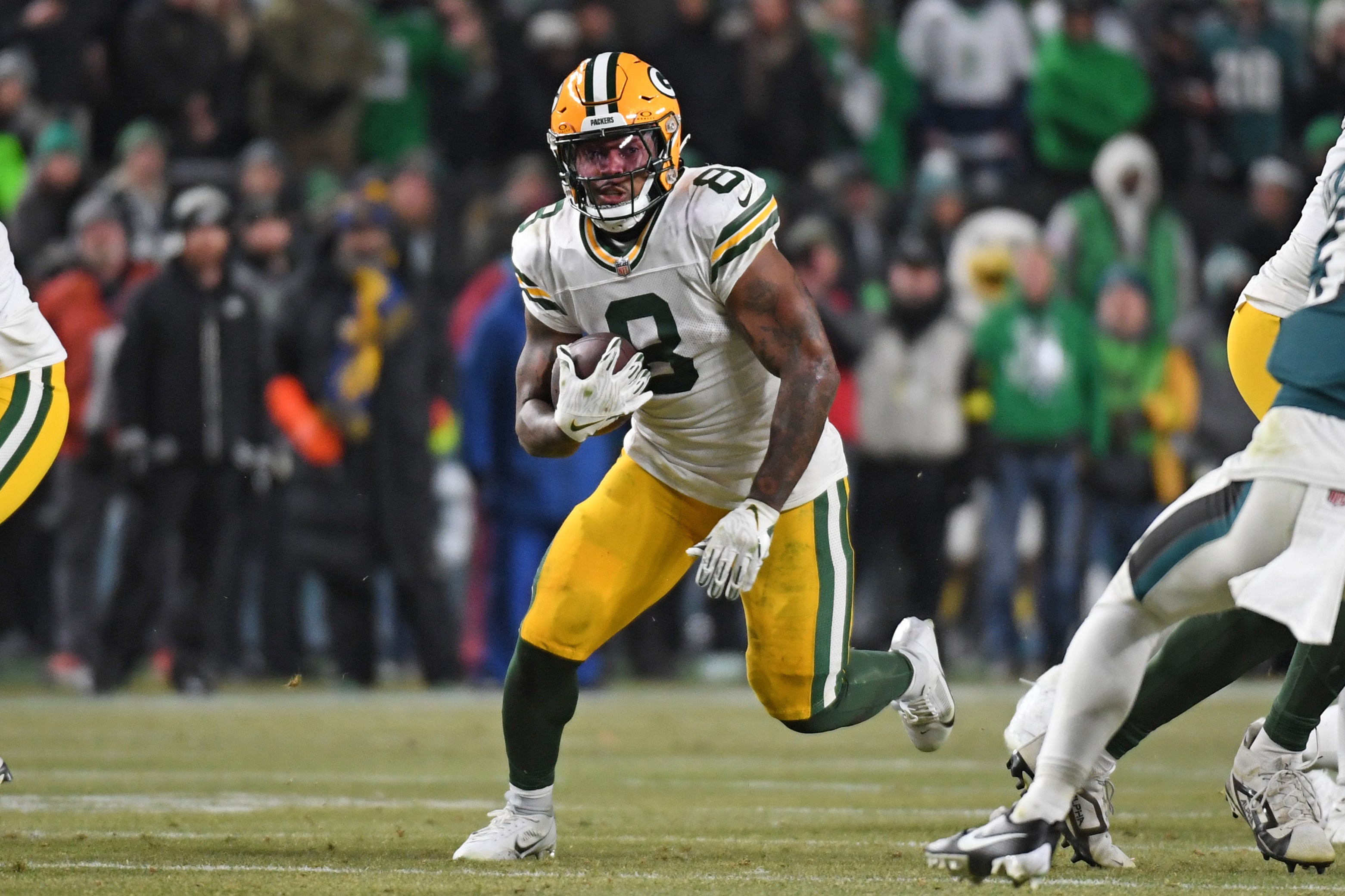 Green Bay Packers running back Josh Jacobs (8) against the Philadelphia Eagles in an NFC wild card game at Lincoln Financial Field.