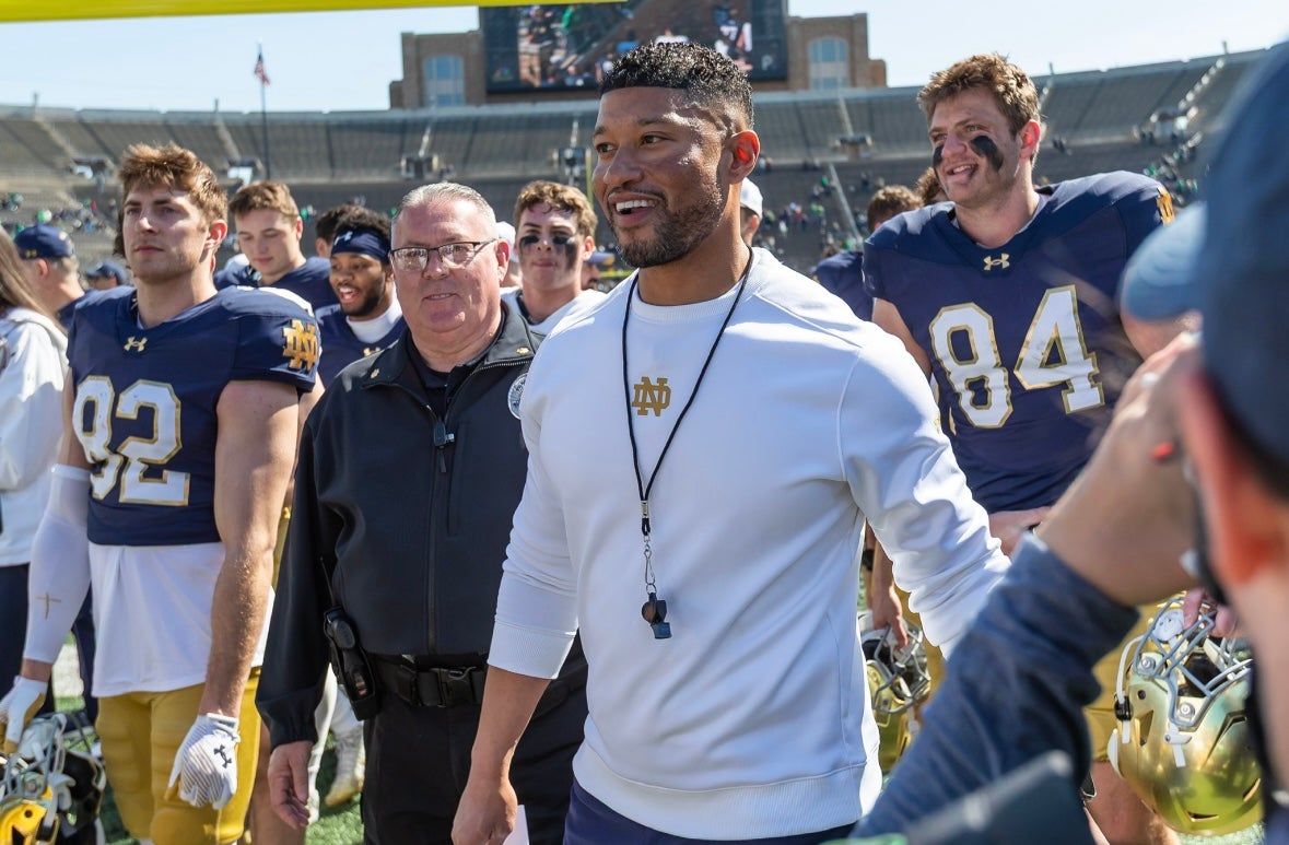 Apr 12, 2025; Notre Dame, IN, USA; Notre Dame Fighting Irish head coach Marcus Freeman smiles as he walks off the field after the Blue-Gold game at Notre Dame Stadium. Mandatory Credit: Michael Caterina-Imagn Images