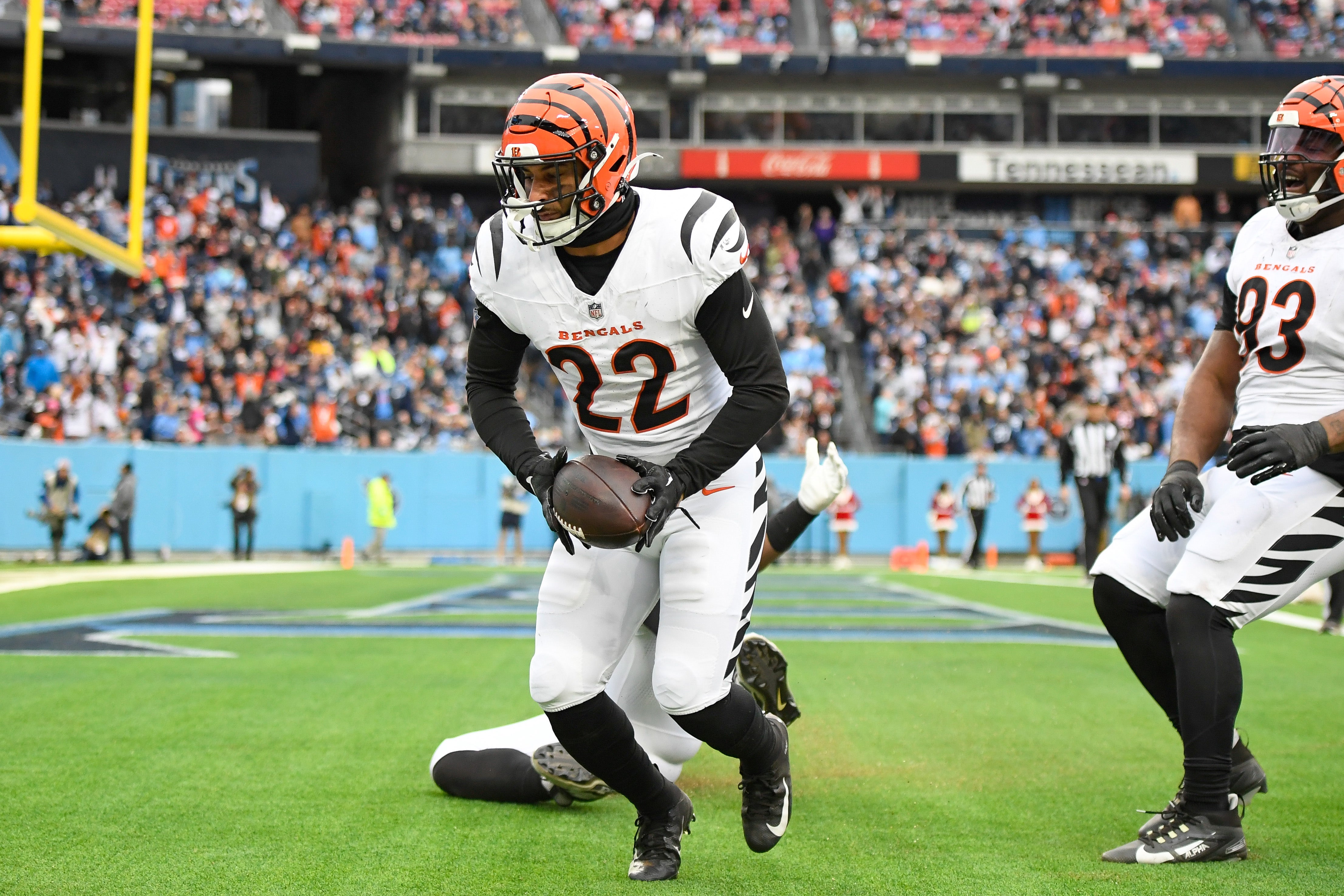 Dec 15, 2024; Nashville, Tennessee, USA; Cincinnati Bengals safety Geno Stone (22) celebrates his touchdown against the Tennessee Titans during the second half at Nissan Stadium.