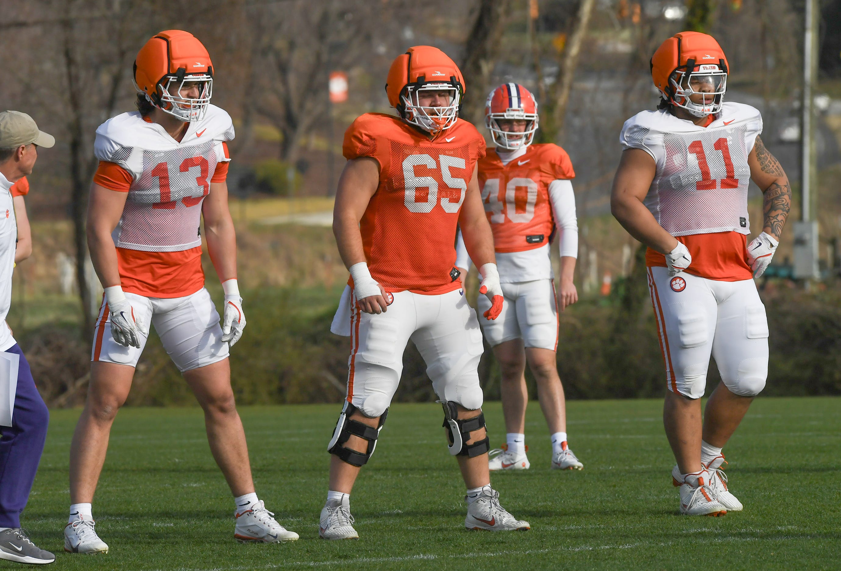 Clemson defensive end Will Heldt (13), left, and defensive lineman Peter Woods (11), right, during the football practice at the Allen N. Reeves Football Complex at Clemson University in Clemson, S.C. Wednesday, March 5, 2025.