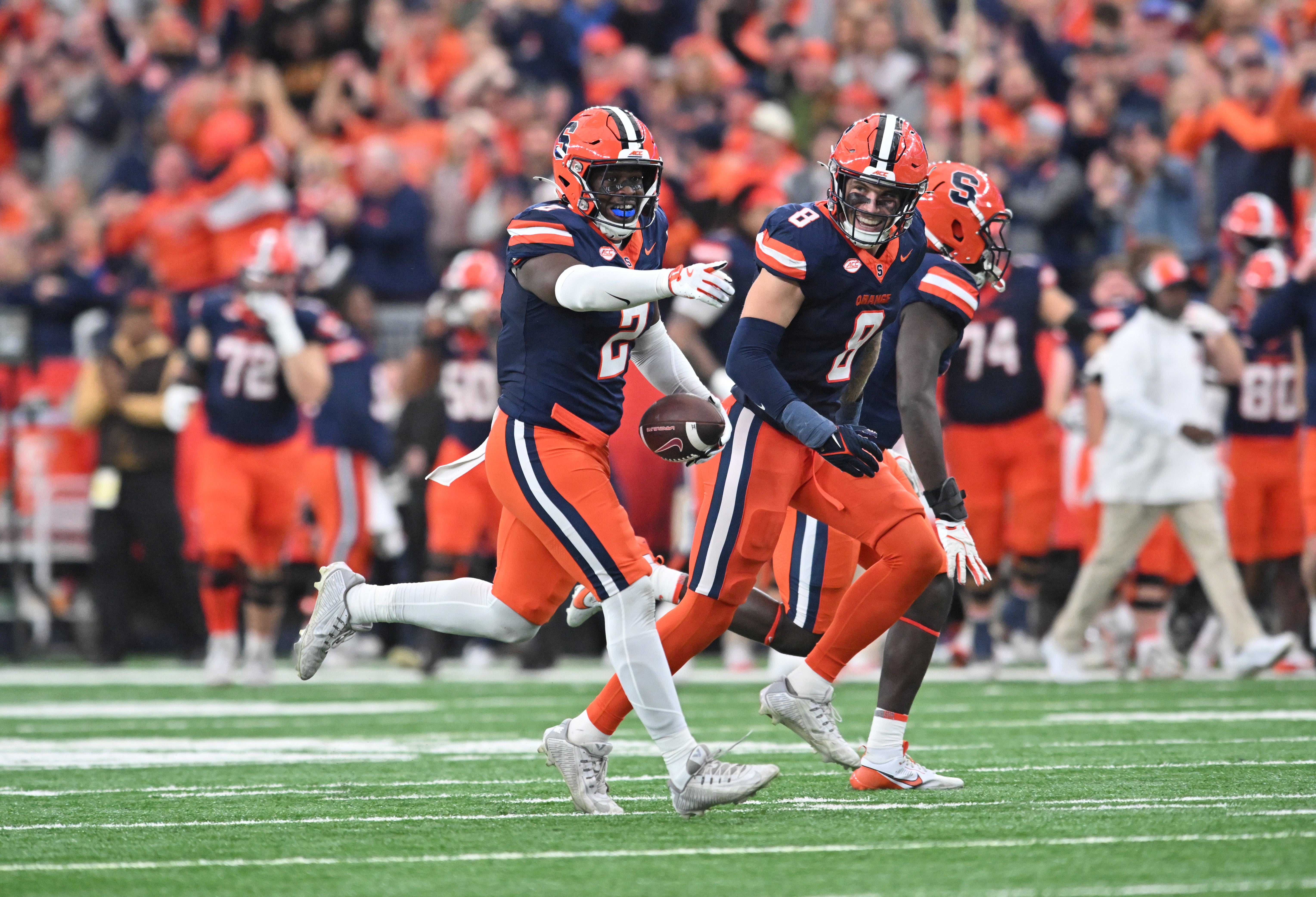 Syracuse Orange linebacker Marlowe Wax (2) reacts to recovering a fumble by the Virginia Tech Hokies with teammate defensive back Justin Barron (8) alongside in the third quarter at JMA Wireless Dome.