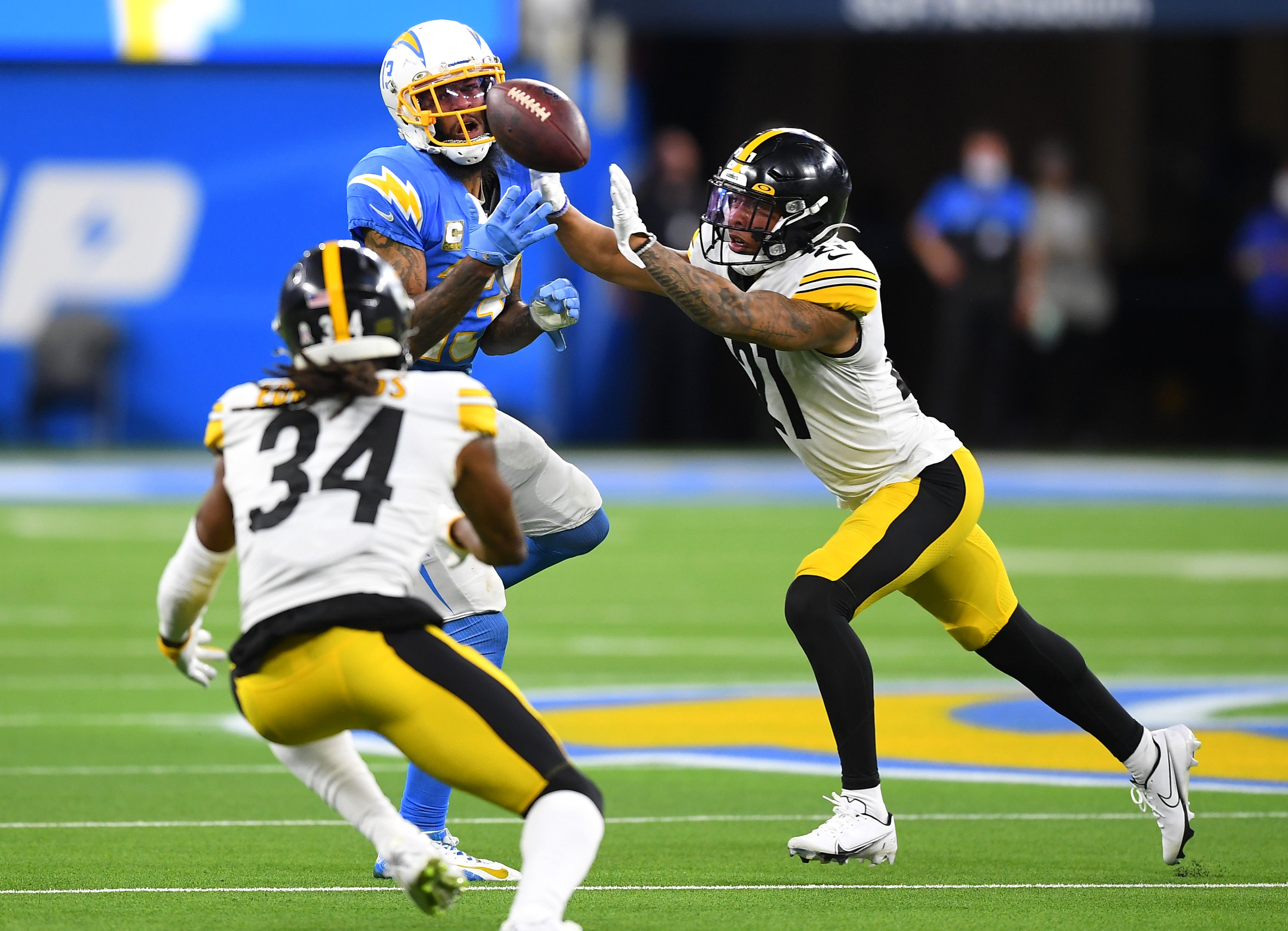 Nov 21, 2021; Inglewood, California, USA; Pittsburgh Steelers cornerback Tre Norwood (21) breaks up a pass intended for Los Angeles Chargers wide receiver Keenan Allen (13) in the second half at SoFi Stadium.
