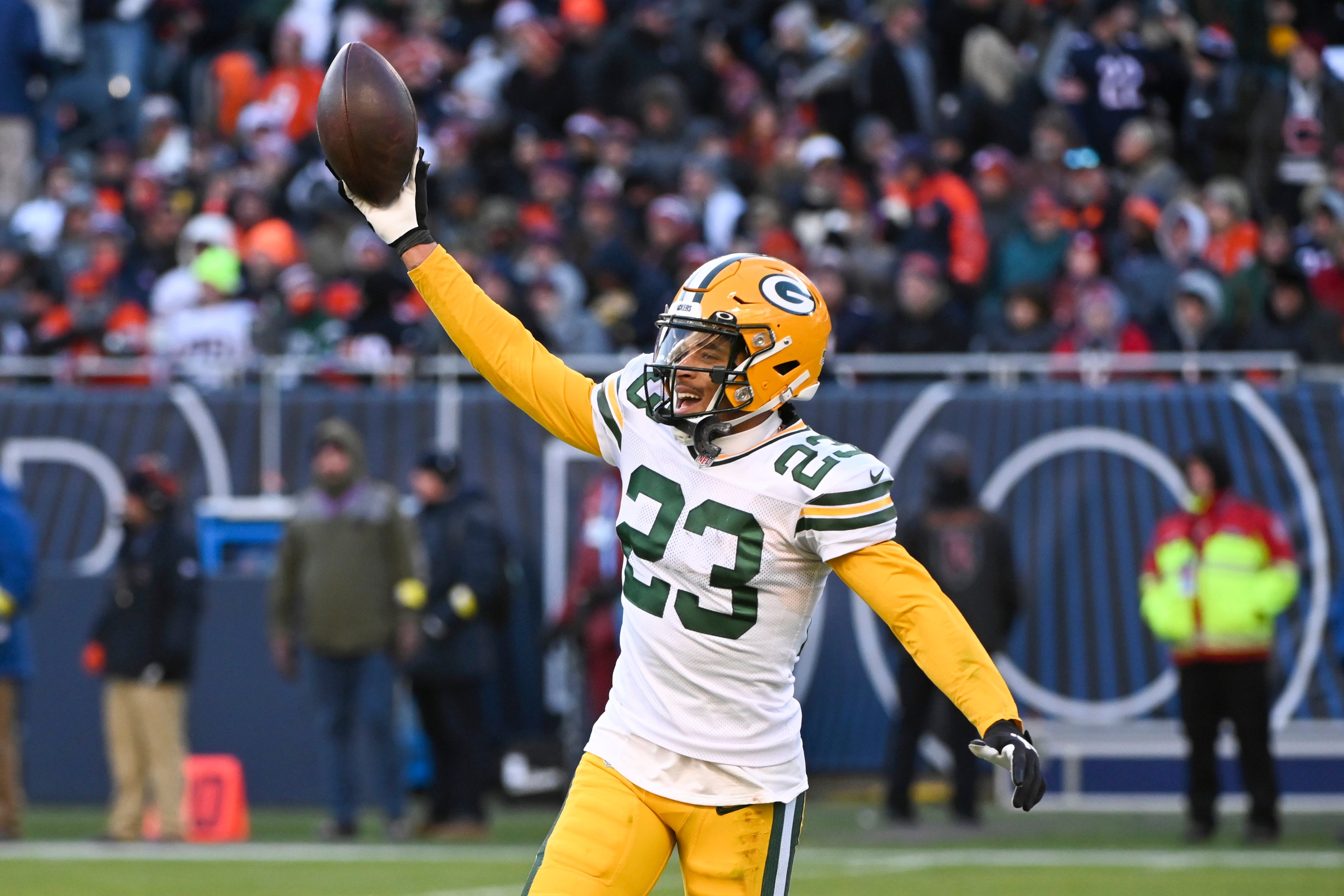 Green Bay Packers cornerback Jaire Alexander (23) celebrates after making an interception against the Chicago Bears during the second half at Soldier Field.