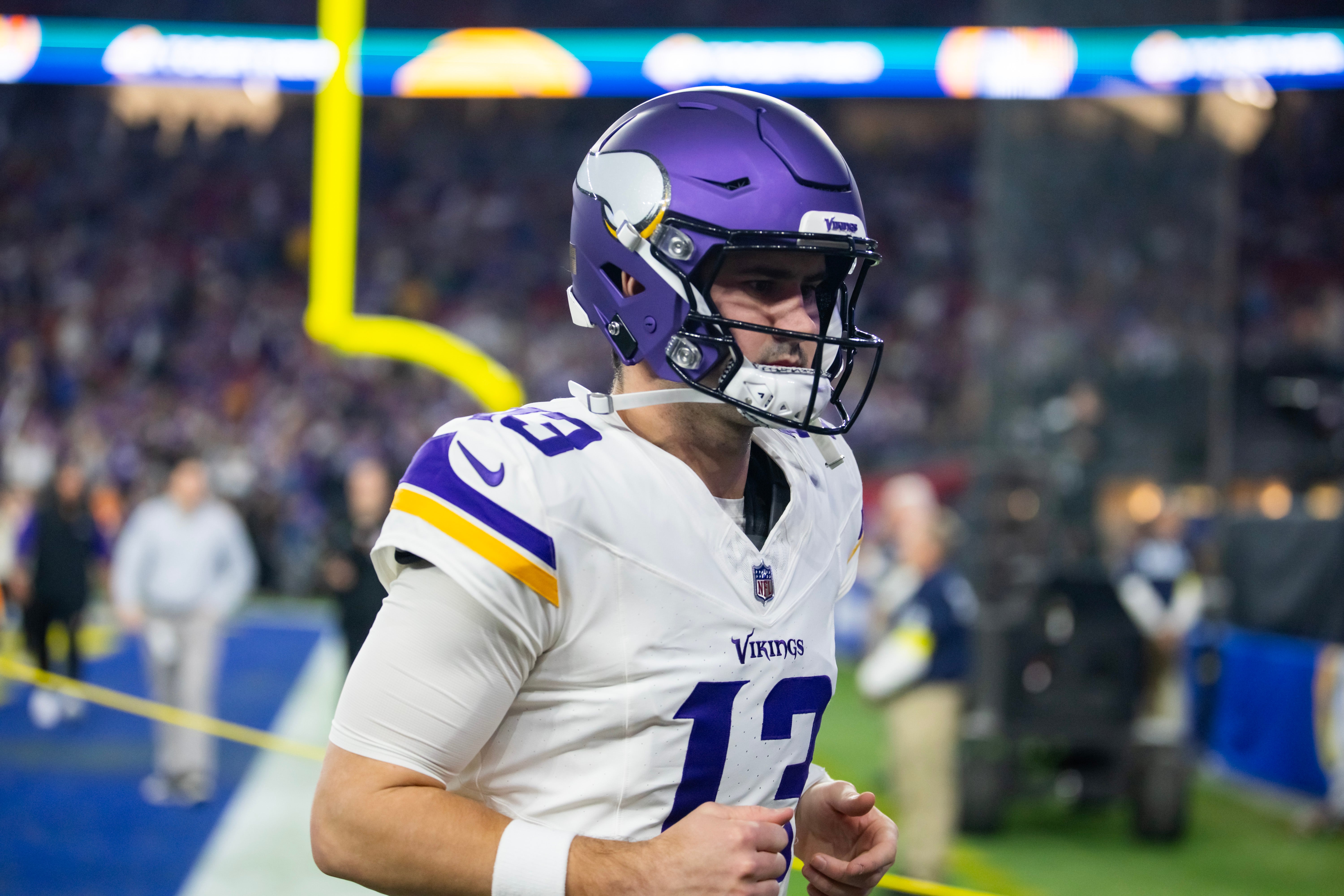Jan 13, 2025; Glendale, AZ, USA; Minnesota Vikings quarterback Daniel Jones (13) against the Los Angeles Rams during an NFC wild card game at State Farm Stadium.