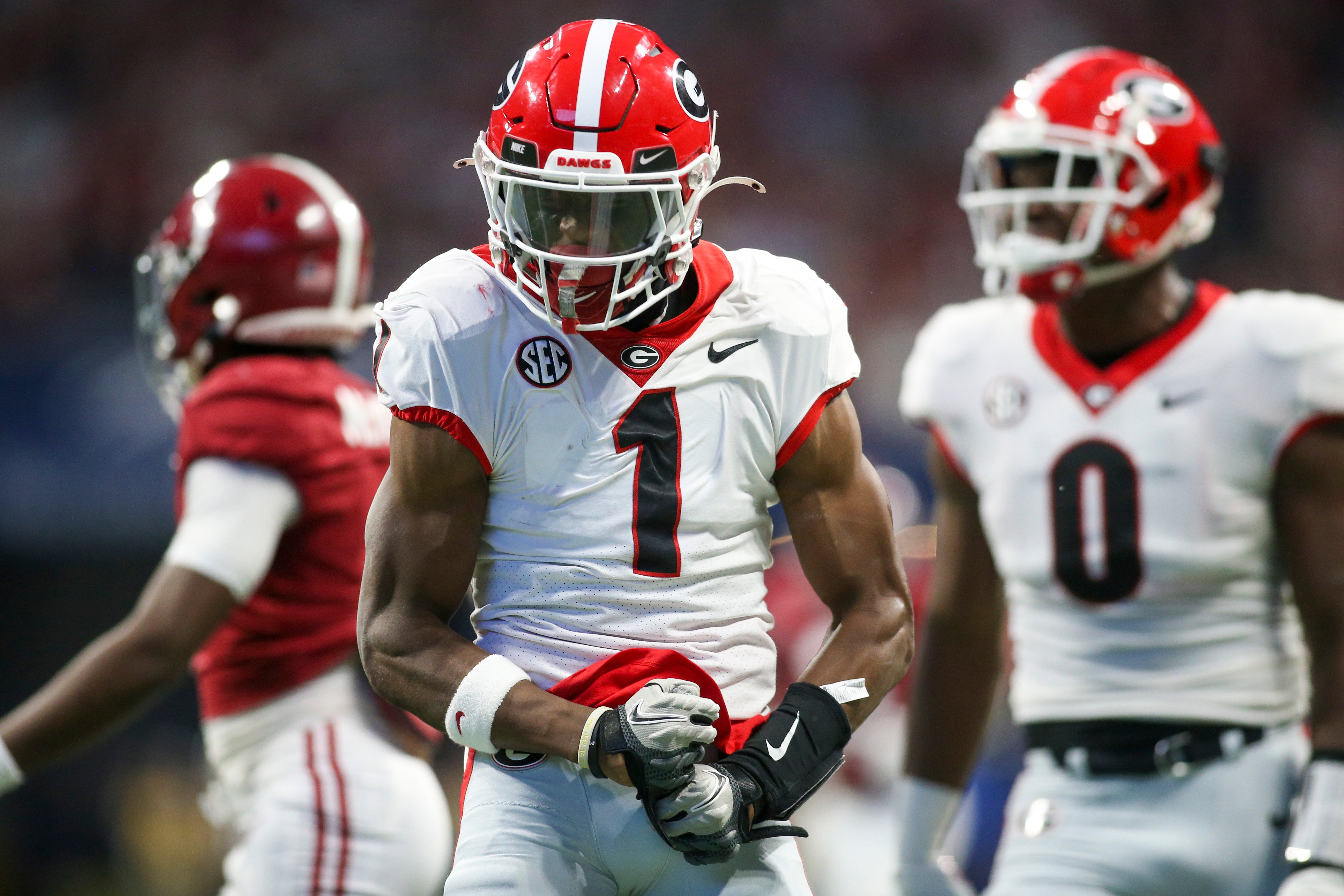Georgia Bulldogs wide receiver George Pickens (1) celebrates after a catch against the Alabama Crimson Tide in the first half during the SEC championship game at Mercedes-Benz Stadium.