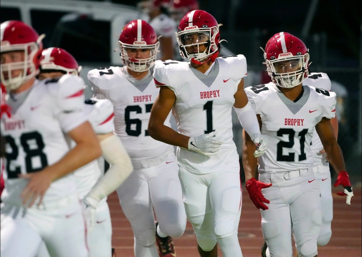 Brophy Prep wide receiver Devin Fitzgerald (1) takes the field with his team during a game at Centennial High School on Sept. 13, 2024.