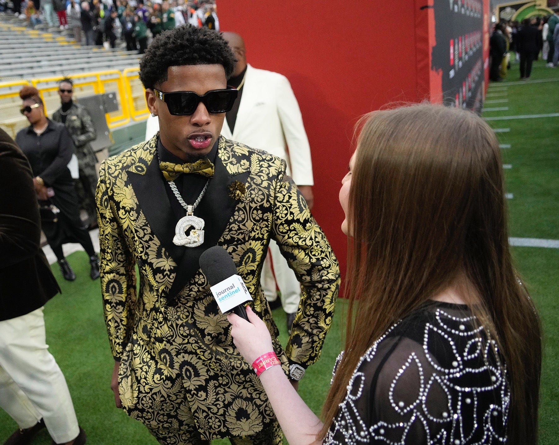 Hannah Kirby interviewing Matthew Golden at the NFL draft red carpet at Lambeau Field on April 24, 2025 ahead of him being picked by the Green Bay Packers later that night.
