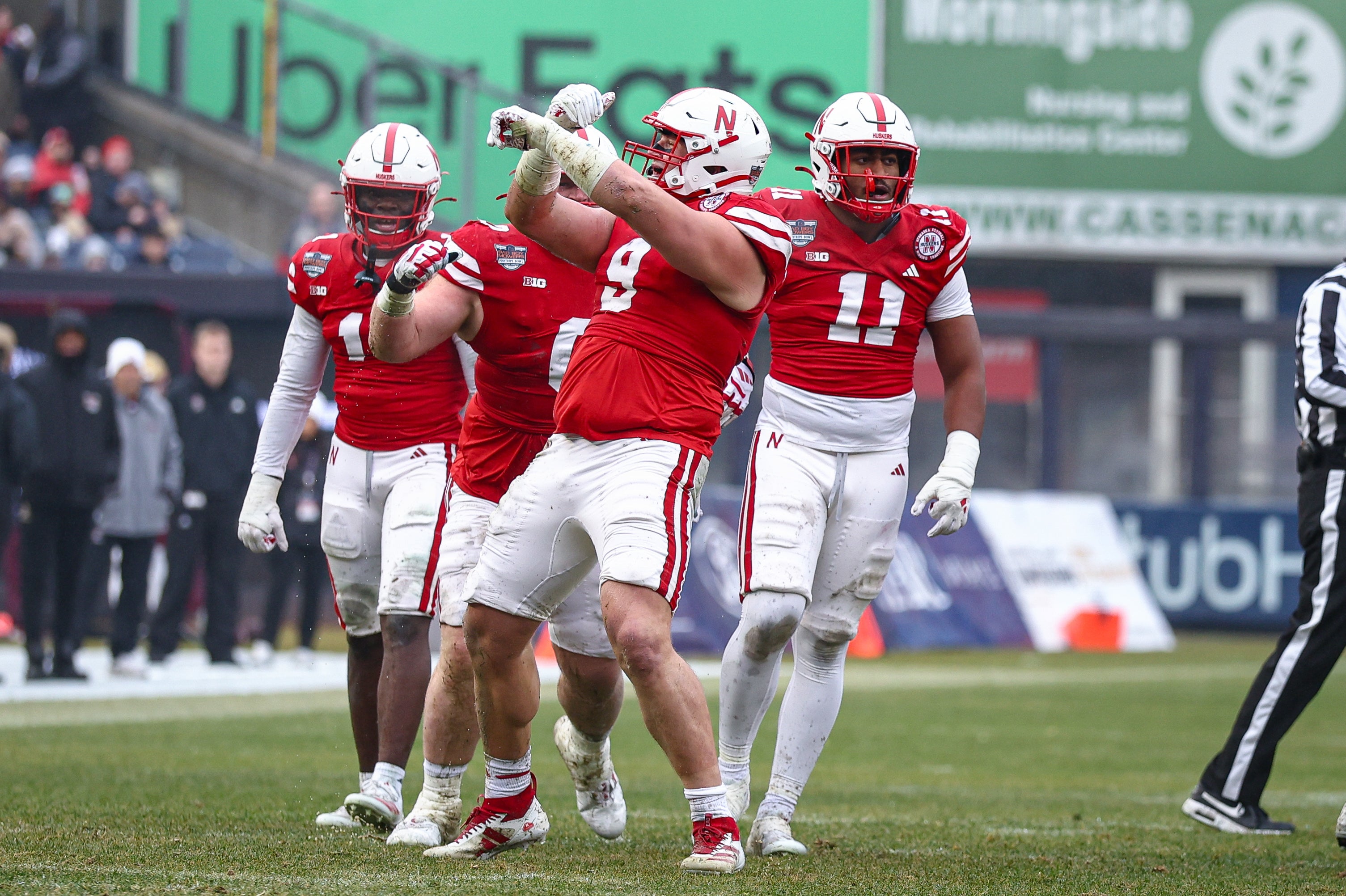 Nebraska Cornhuskers defensive lineman Ty Robinson (9) celebrates a defensive stop during the first half against the Boston College Eagles at Yankee Stadium.