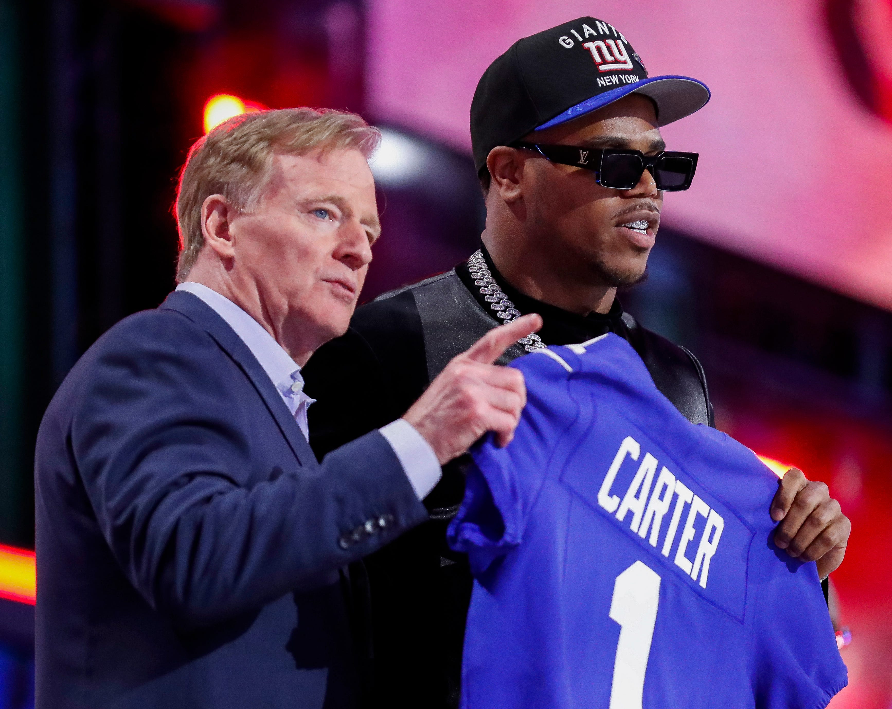 NFL Commissioner points out New York Giants fans to edge rusher Abdul Carter after the Giants select Carter with the third pick during the first round of the 2025 NFL Draft on Thursday, April 24, 2025, at Lambeau Field in Green Bay, Wisconsin. The draft runs through April 26.