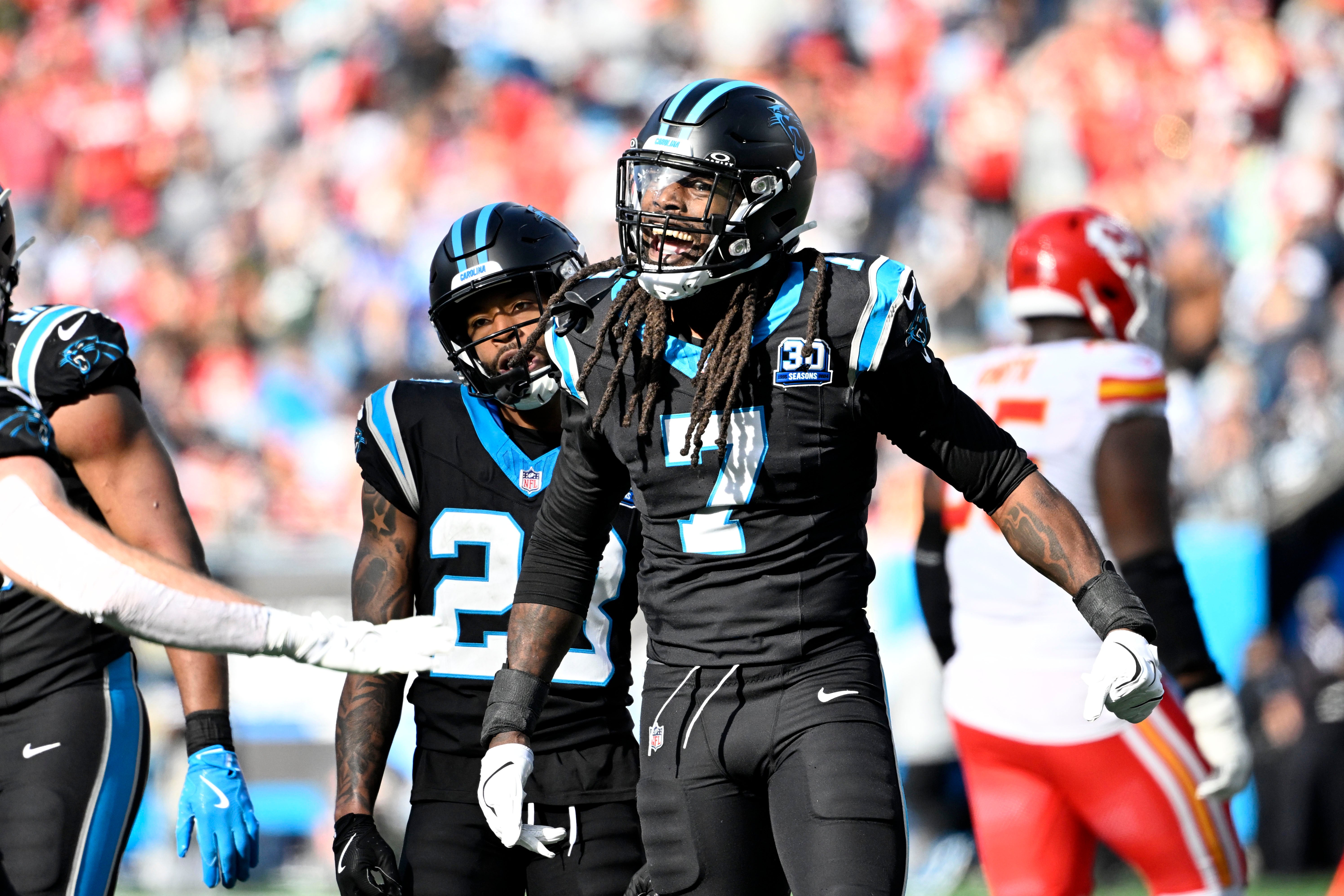 Nov 24, 2024; Charlotte, North Carolina, USA; Carolina Panthers linebacker Jadeveon Clowney (7) reacts after making a sack in the second quarter at Bank of America Stadium.