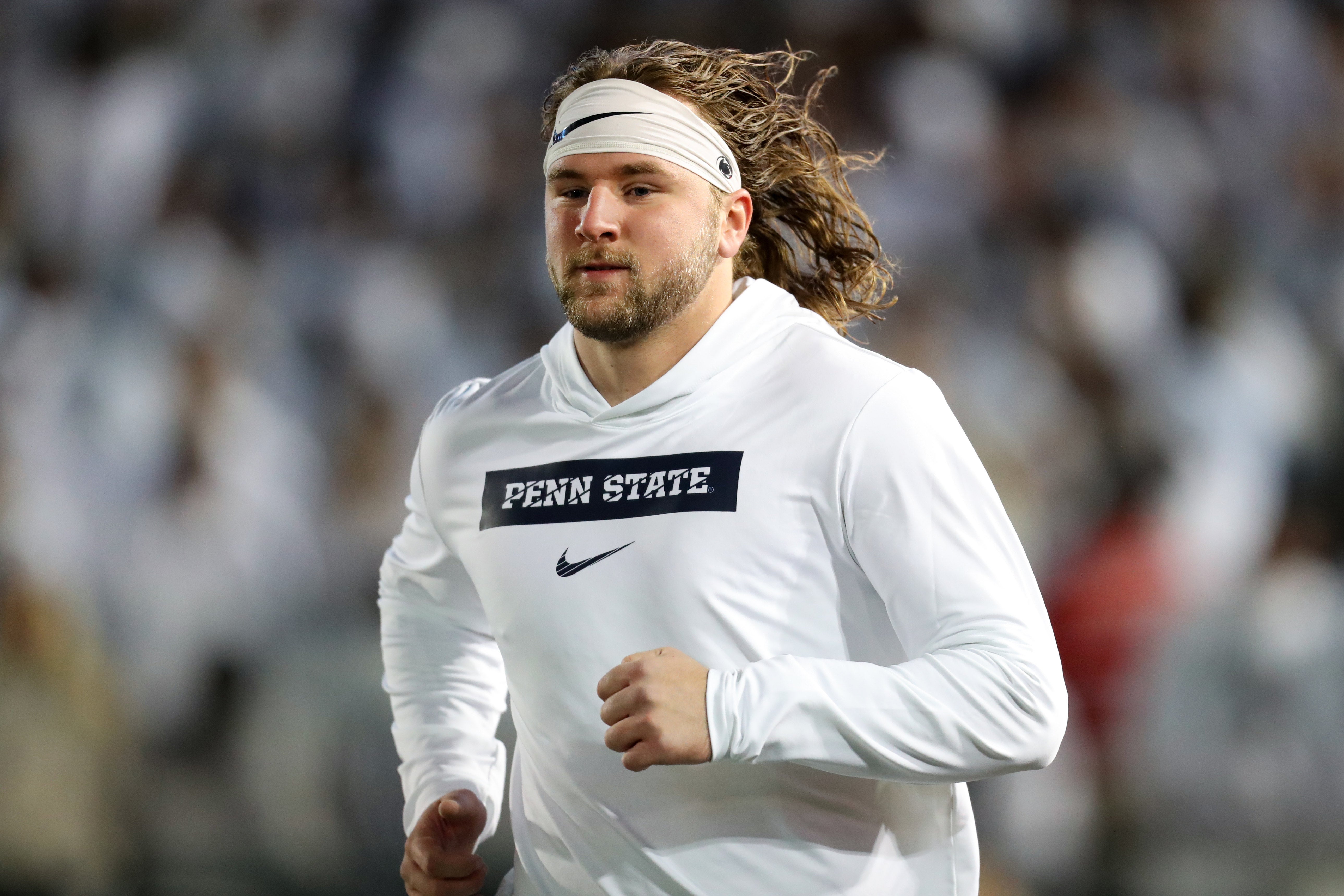 Nov 9, 2024; University Park, Pennsylvania, USA; Penn State Nittany Lions tight end Tyler Warren (44) warms up before a game against the Washington Huskies at Beaver Stadium.