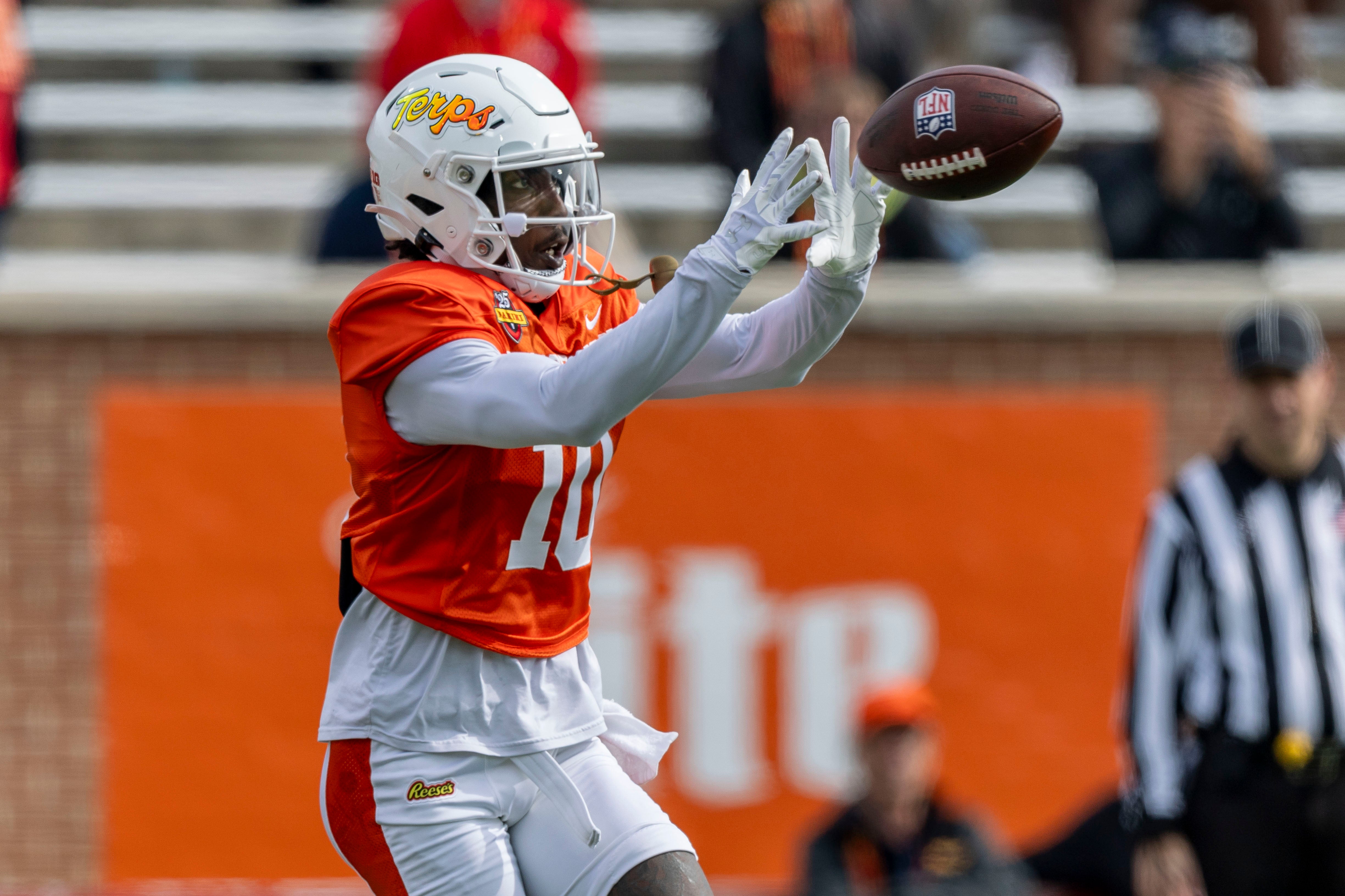 Jan 28, 2025; Mobile, AL, USA; American team wide receiver Tai Felton of Maryland (10) grabs a pass during Senior Bowl practice for the American team at Hancock Whitney Stadium.