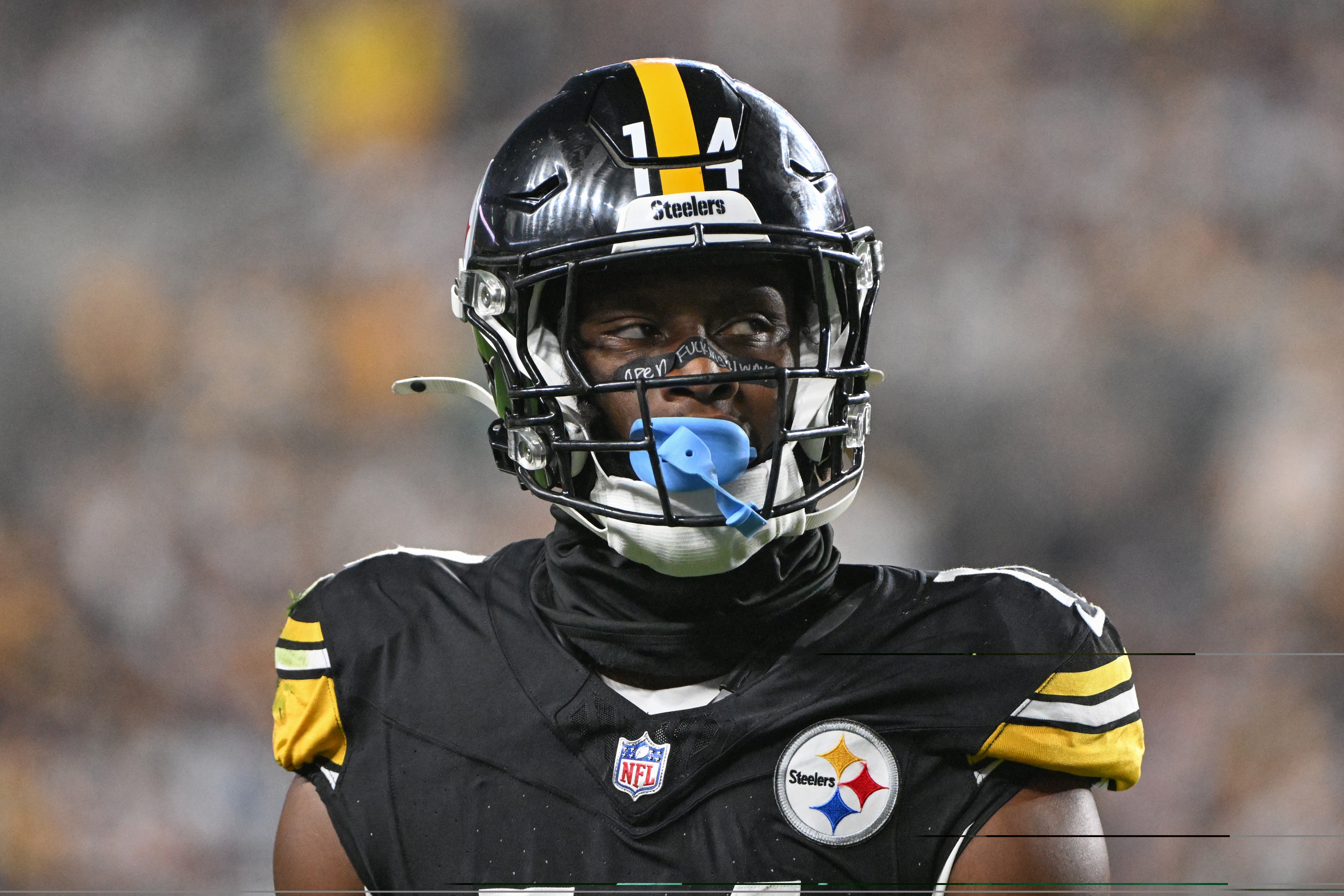Pittsburgh Steelers wide receiver George Pickens (14) walks off the field against the Dallas Cowboys during the third quarter at Acrisure Stadium.