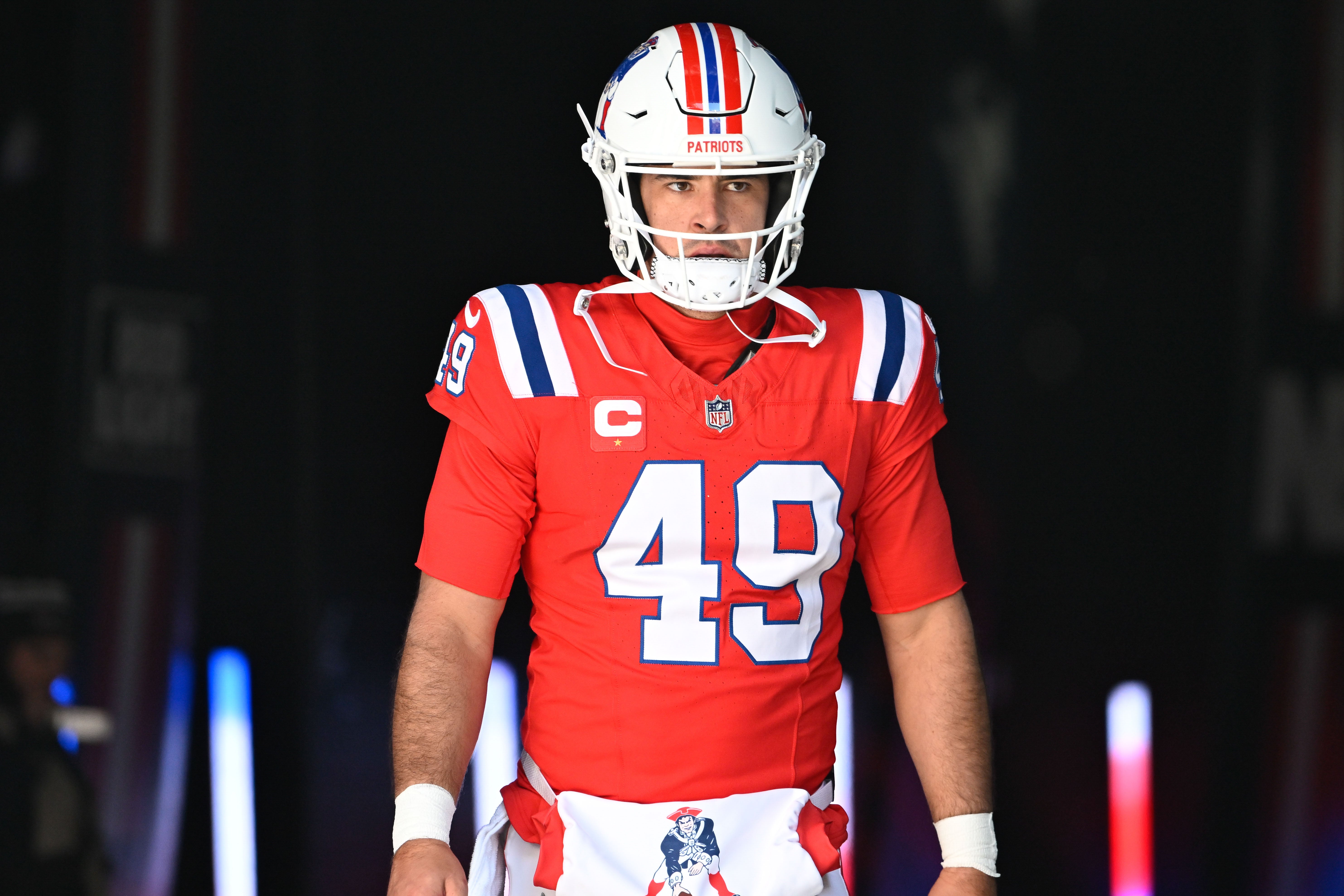 Dec 1, 2024; Foxborough, Massachusetts, USA; New England Patriots long snapper Joe Cardona (49) walks out of the player's tunnel b