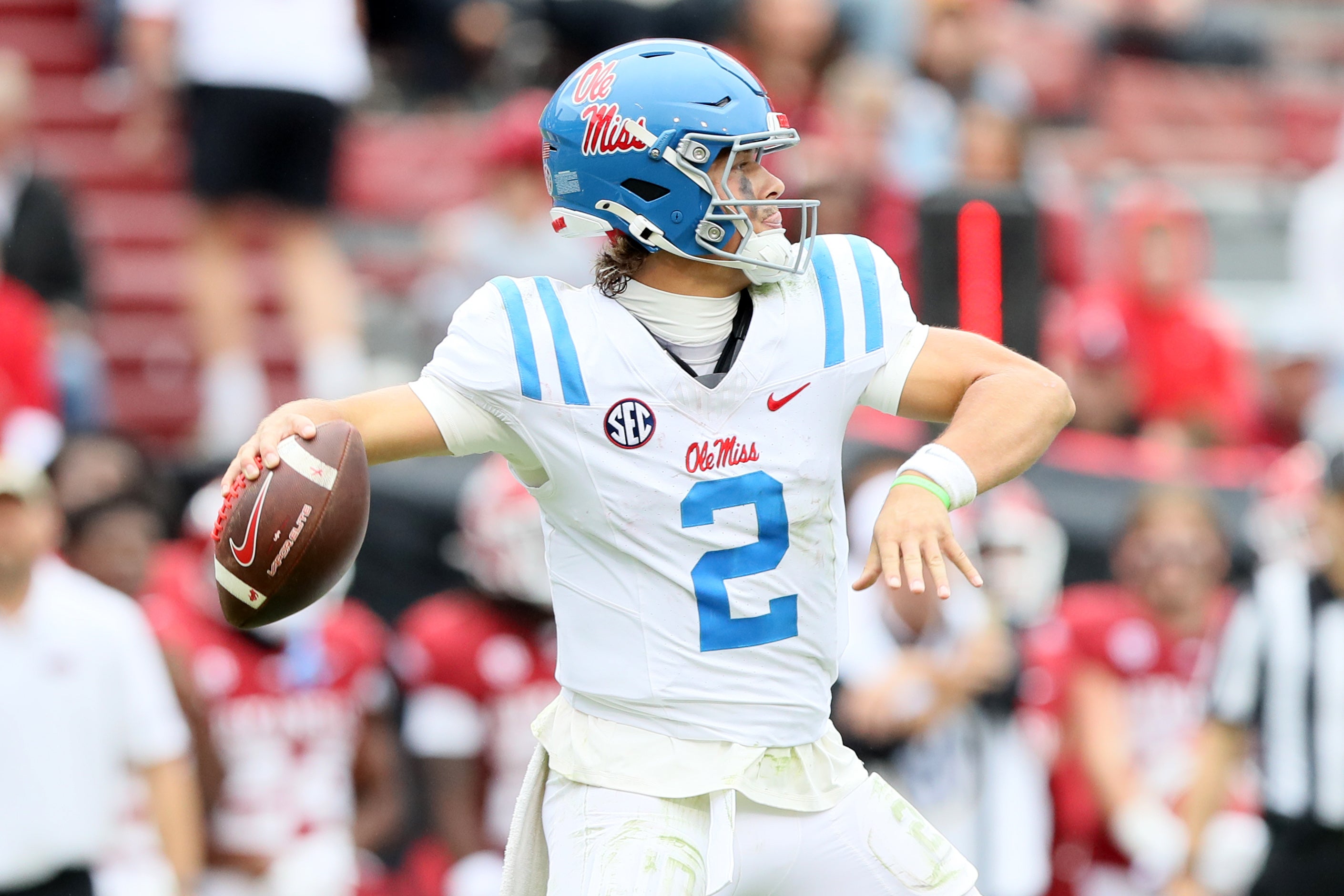 Nov 2, 2024; Fayetteville, Arkansas, USA; Ole Miss Rebels quarterback Jaxson Dart (2) passes in the fourth quarter against the Arkansas Razorbacks at Donald W. Reynolds Razorback Stadium. Mississippi won 63-31.