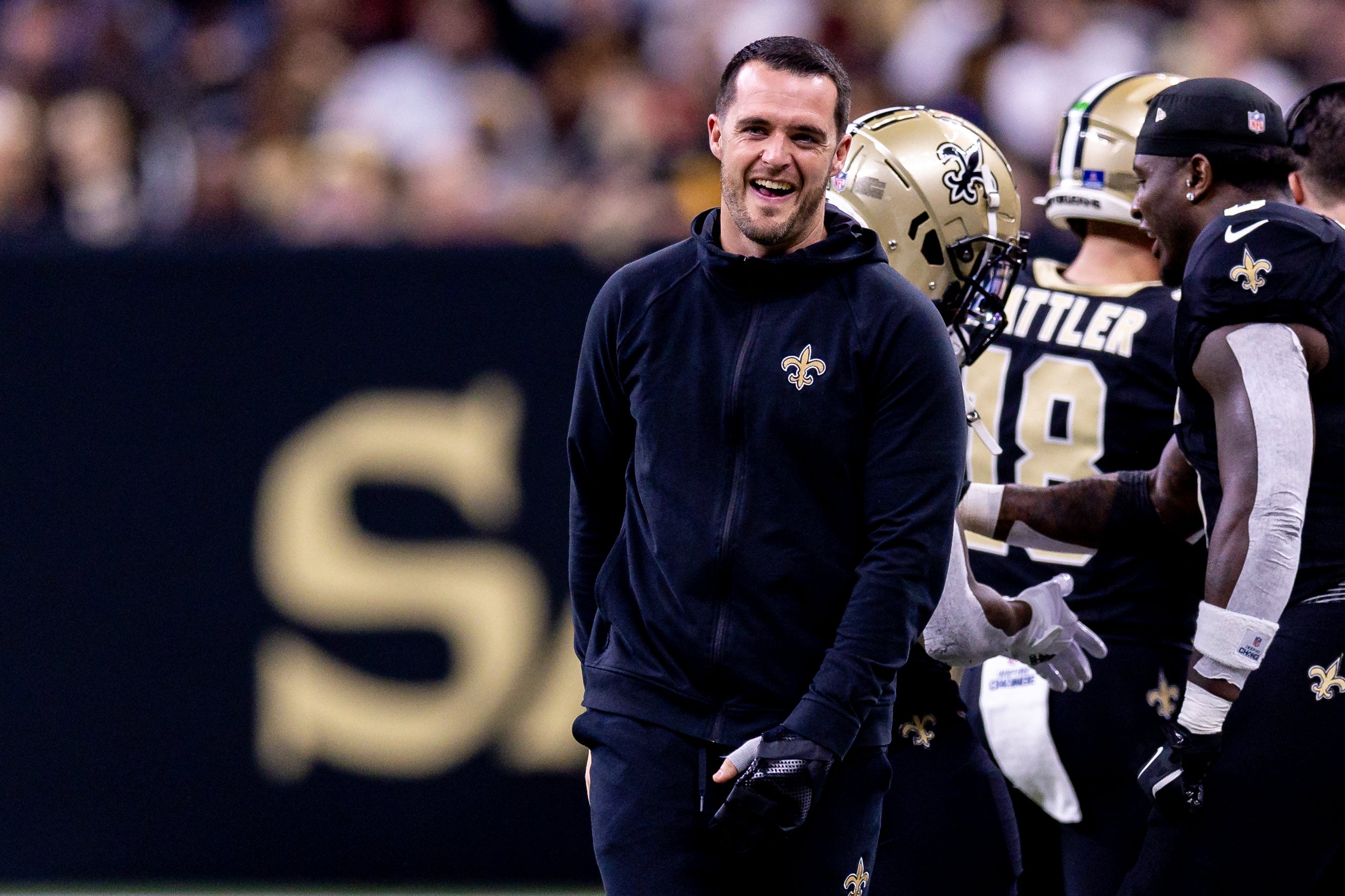 Dec 15, 2024; New Orleans, Louisiana, USA; New Orleans Saints quarterback Derek Carr (4) after a touchdown against the Washington Commanders during the second half at Caesars Superdome.