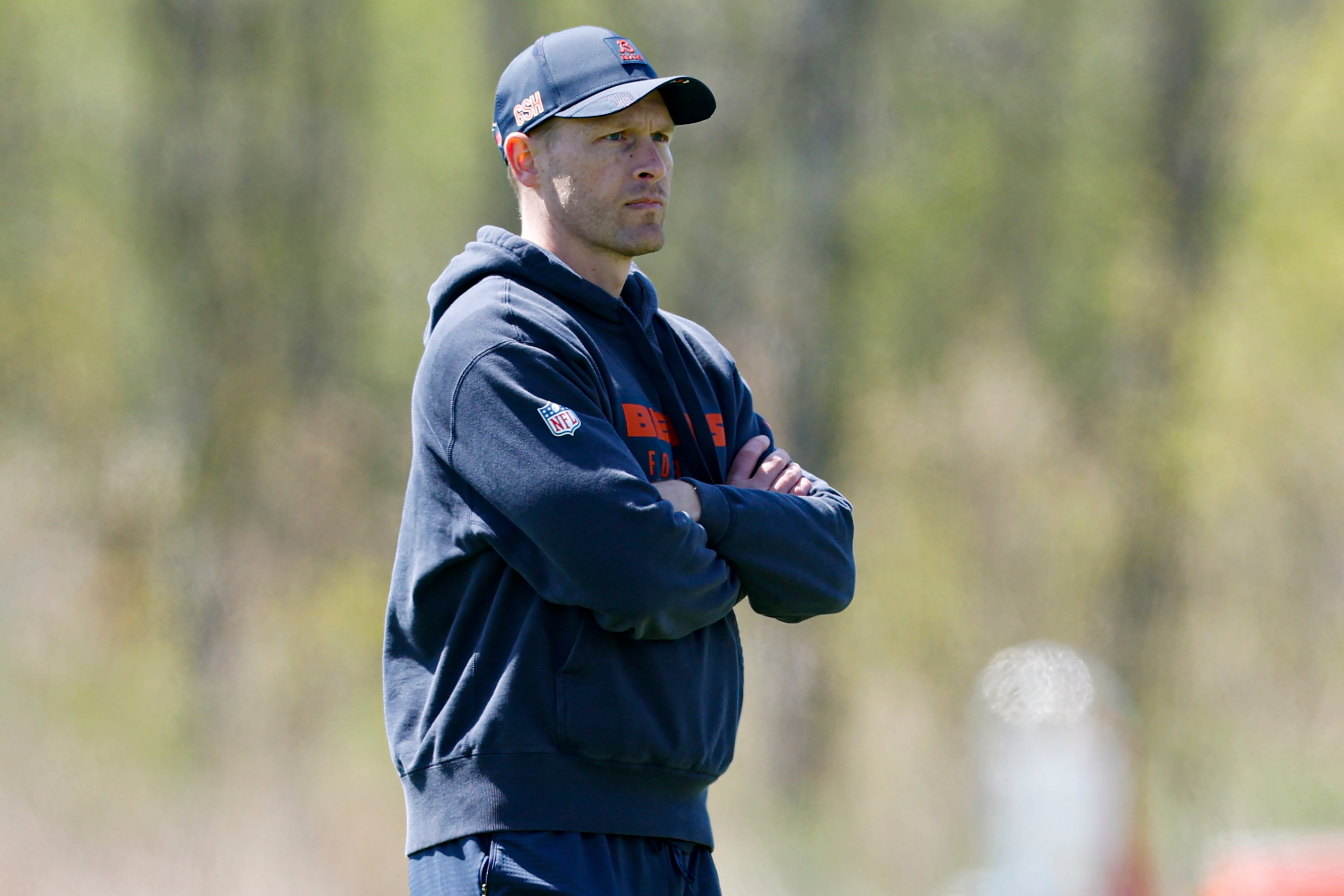 May 9, 2025; Lake Forest, IL, USA; Chicago Bears head coach Ben Johnson (R) looks on during the Rookie Minicamp at Halas Hall.