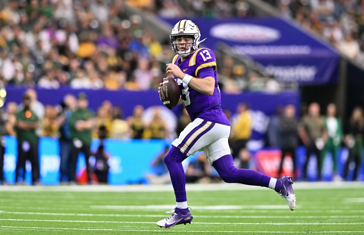 Dec 31, 2024; Houston, TX, USA; LSU Tigers quarterback Garrett Nussmeier (13) runs the ball during the first half against the Baylor Bears at NRG Stadium. Mandatory Credit: Maria Lysaker-Imagn Images