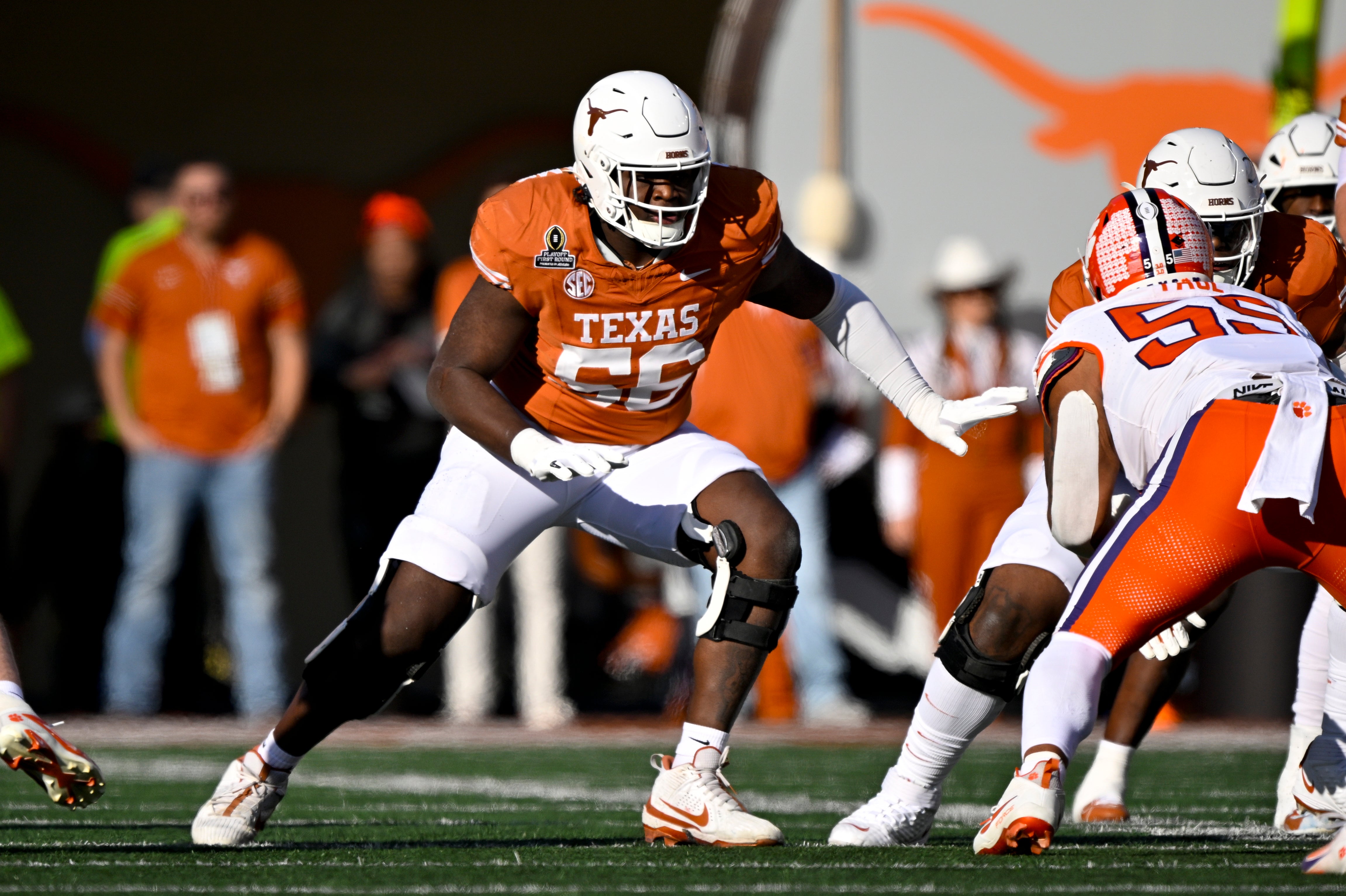 Dec 21, 2024; Austin, Texas, USA; Texas Longhorns offensive lineman Cameron Williams (56) in action during the game between the Texas Longhorns and the Clemson Tigers in the CFP National Playoff First Round at Darrell K Royal-Texas Memorial Stadium.