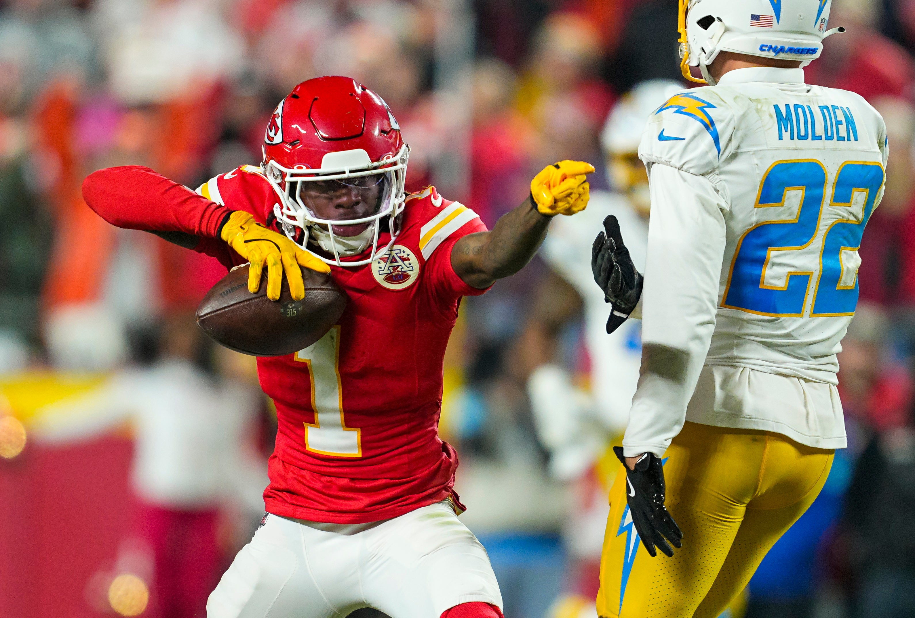 Dec 8, 2024; Kansas City, Missouri, USA; Los Angeles Chargers wide receiver Quentin Johnston (1) celebrates a first down during the second half against the Los Angeles Chargers at GEHA Field at Arrowhead Stadium.