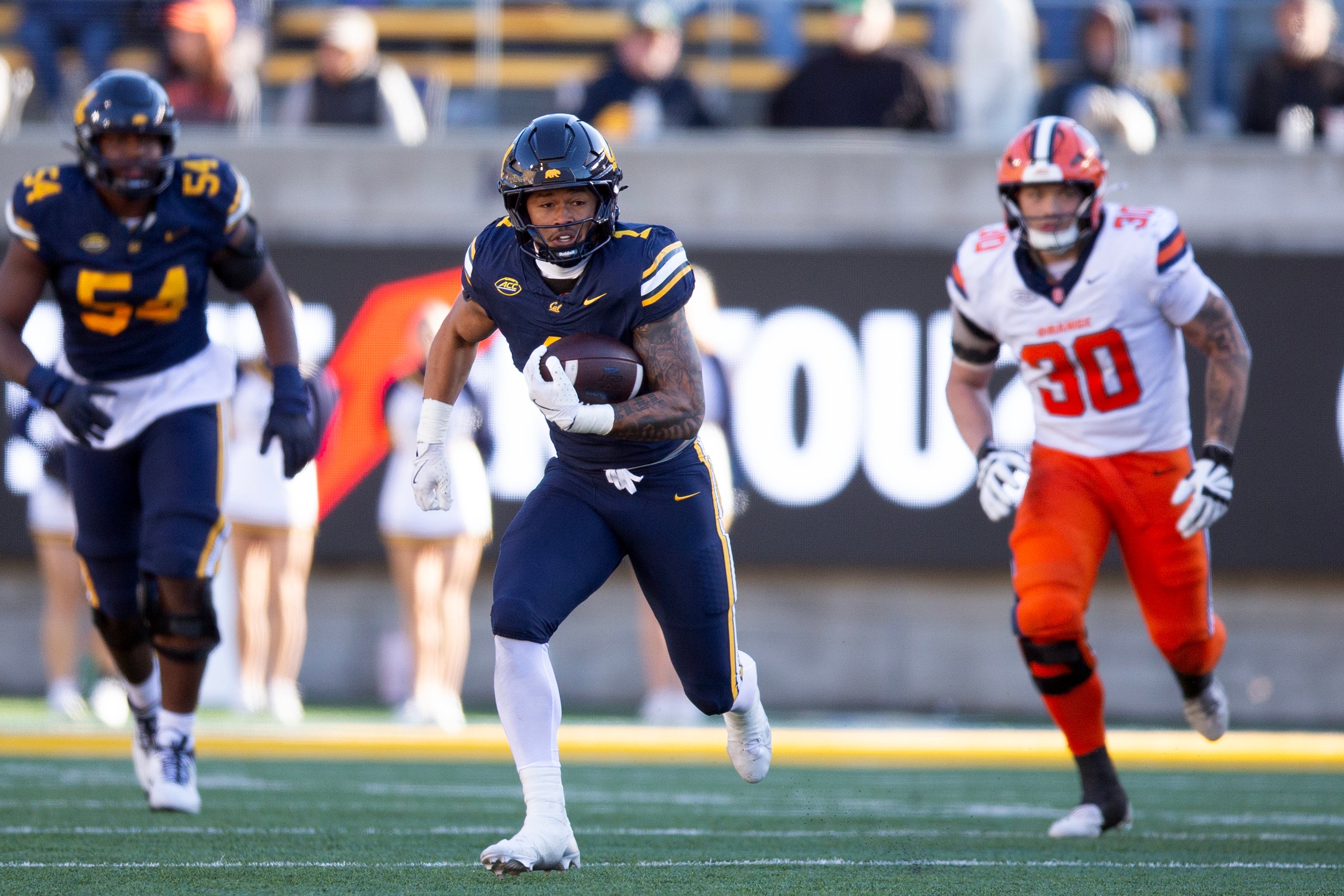 Nov 16, 2024; Berkeley, California, USA; California Golden Bears running back Jaydn Ott (1) makes a 53-yard gain against the Syracuse Orange during the fourth quarter at California Memorial Stadium.