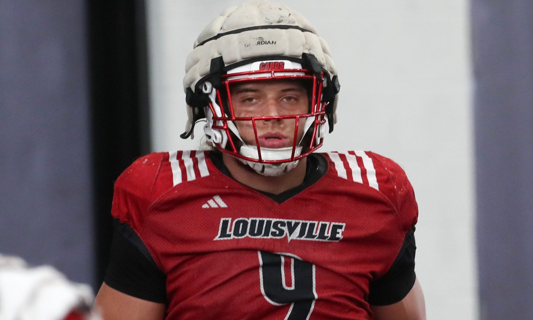Louisville’s Ashton Gillotte warms up for Spring Practice on Thursday. April 4, 2024