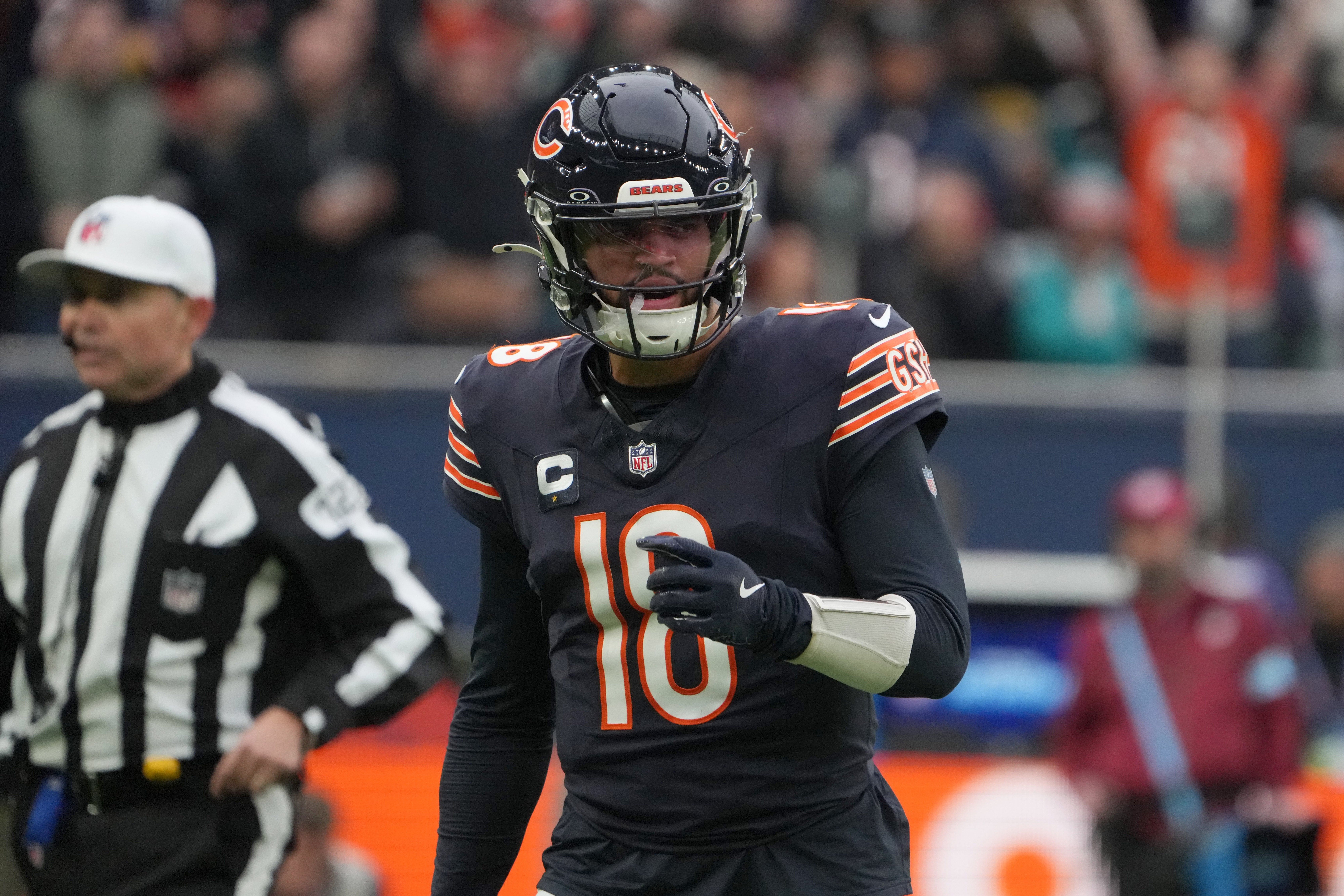 Oct 13, 2024; London, United Kingdom; Chicago Bears quarterback Caleb Williams (18) celebrates after a touchdown against the Jacksonville Jaguars in the second half during an NFL International Series game at Tottenham Hotspur Stadium.