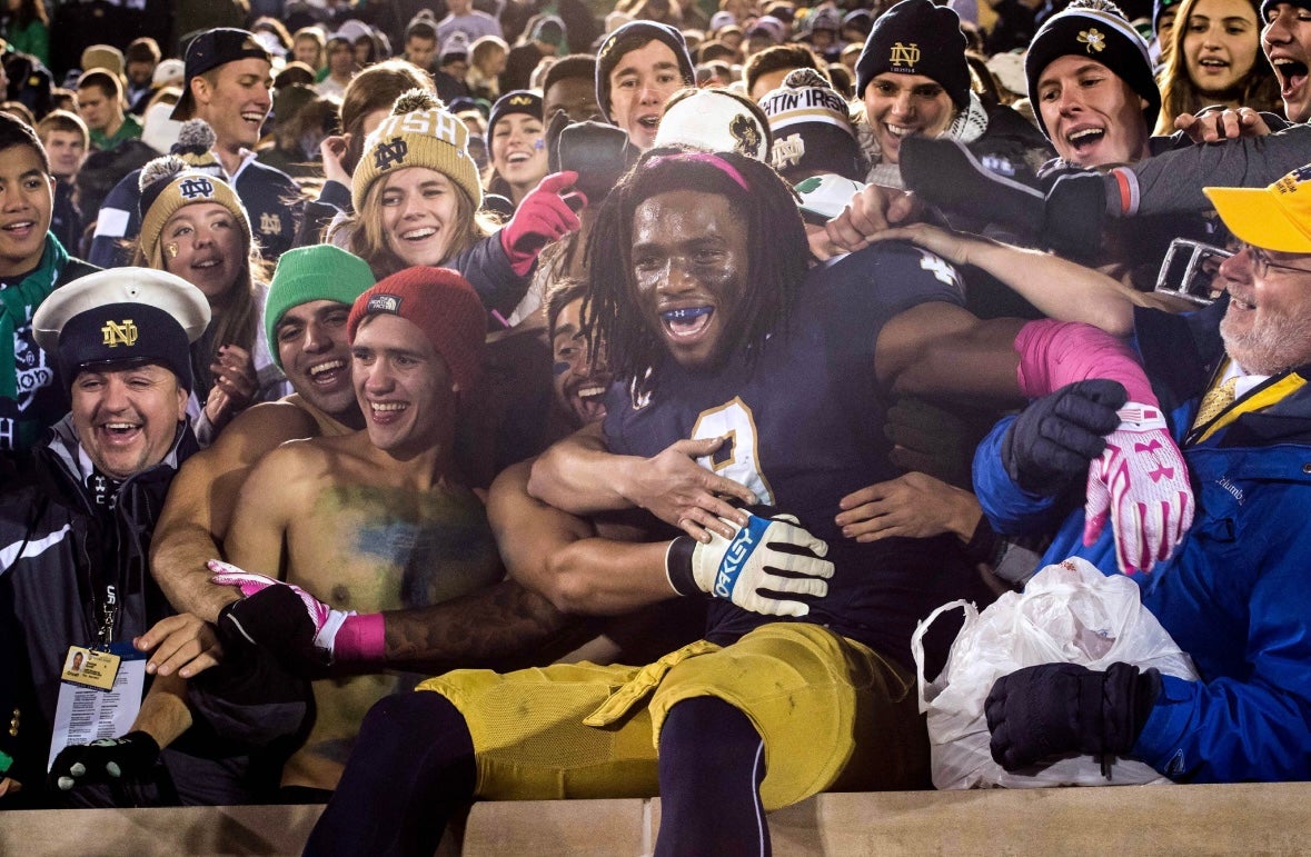 Oct 17, 2015; South Bend, IN, USA; Notre Dame Fighting Irish linebacker Jaylon Smith (9) celebrates with students after defeating the USC Trojans 41-31 at Notre Dame Stadium. Mandatory Credit: Matt Cashore-Imagn Images