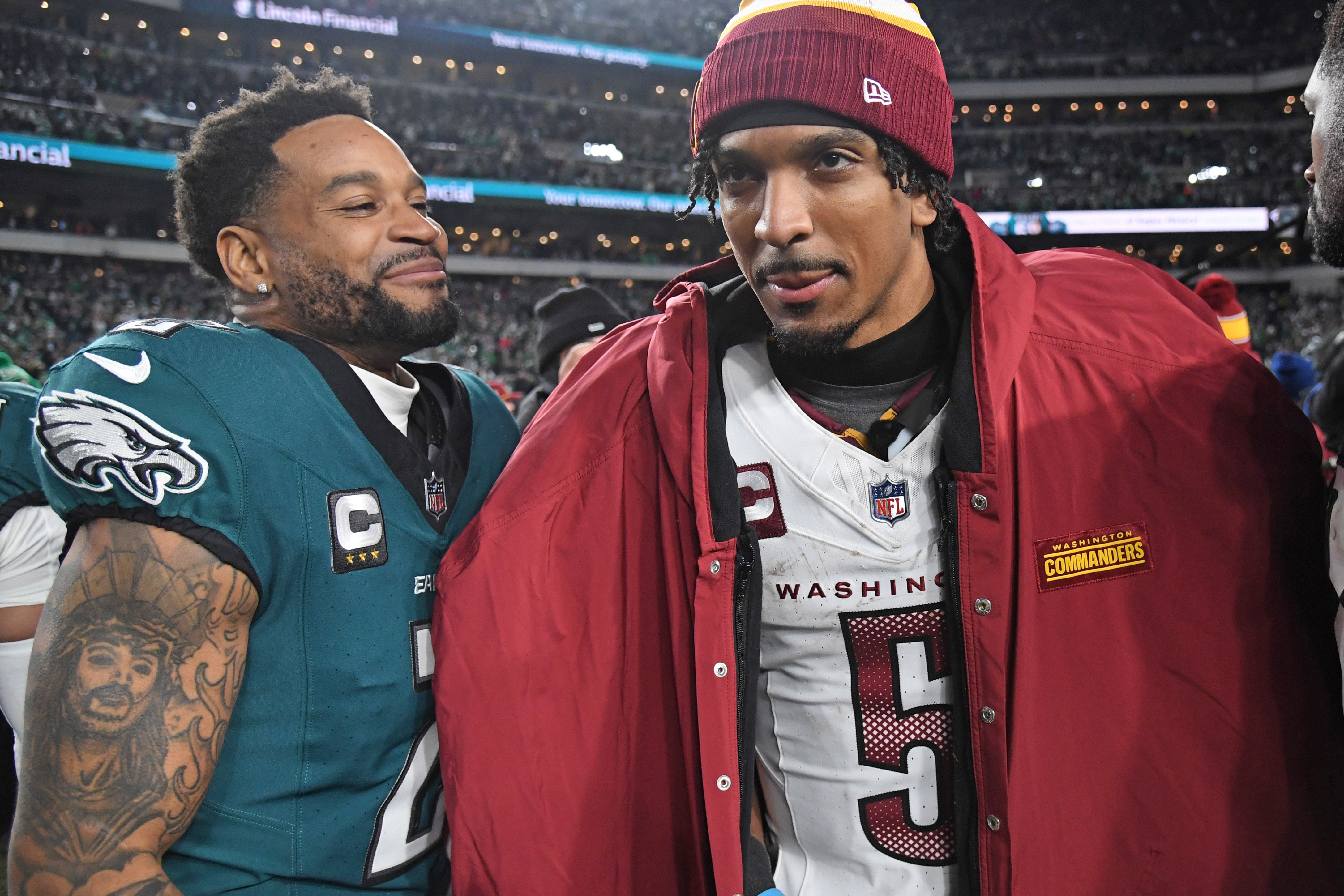 Jan 26, 2025; Philadelphia, PA, USA; Philadelphia Eagles cornerback Darius Slay Jr. (2) and Washington Commanders quarterback Jayden Daniels (5) after the NFC Championship game at Lincoln Financial Field.