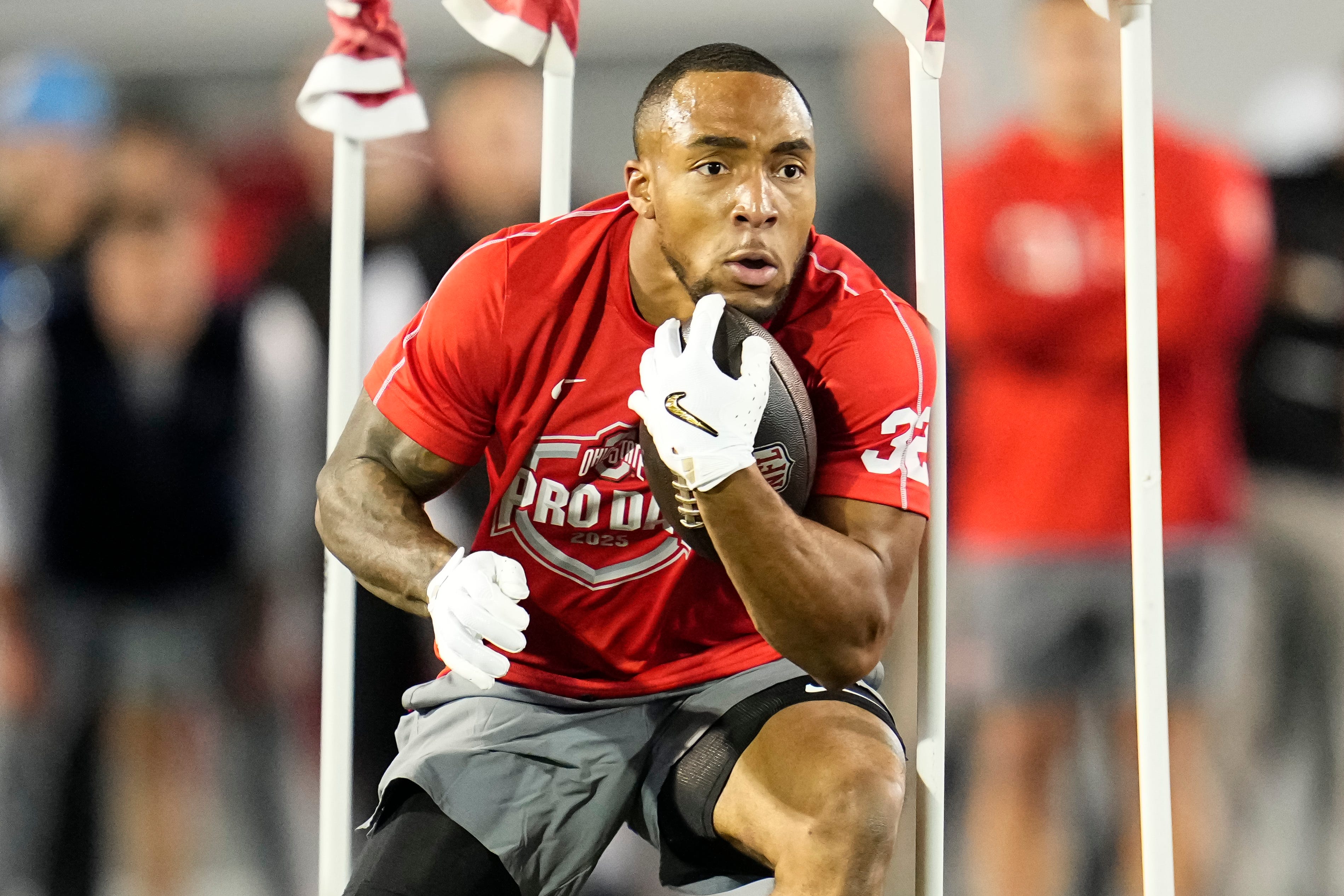 Ohio State Buckeyes running back TreVeyon Henderson works out during the pro day for NFL scouts at the Woody Hayes Athletic Cente on March 26, 2025.