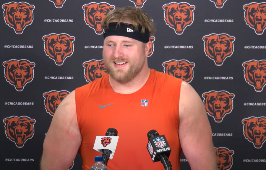 Luke Newman addresses the media during rookie minicamp.