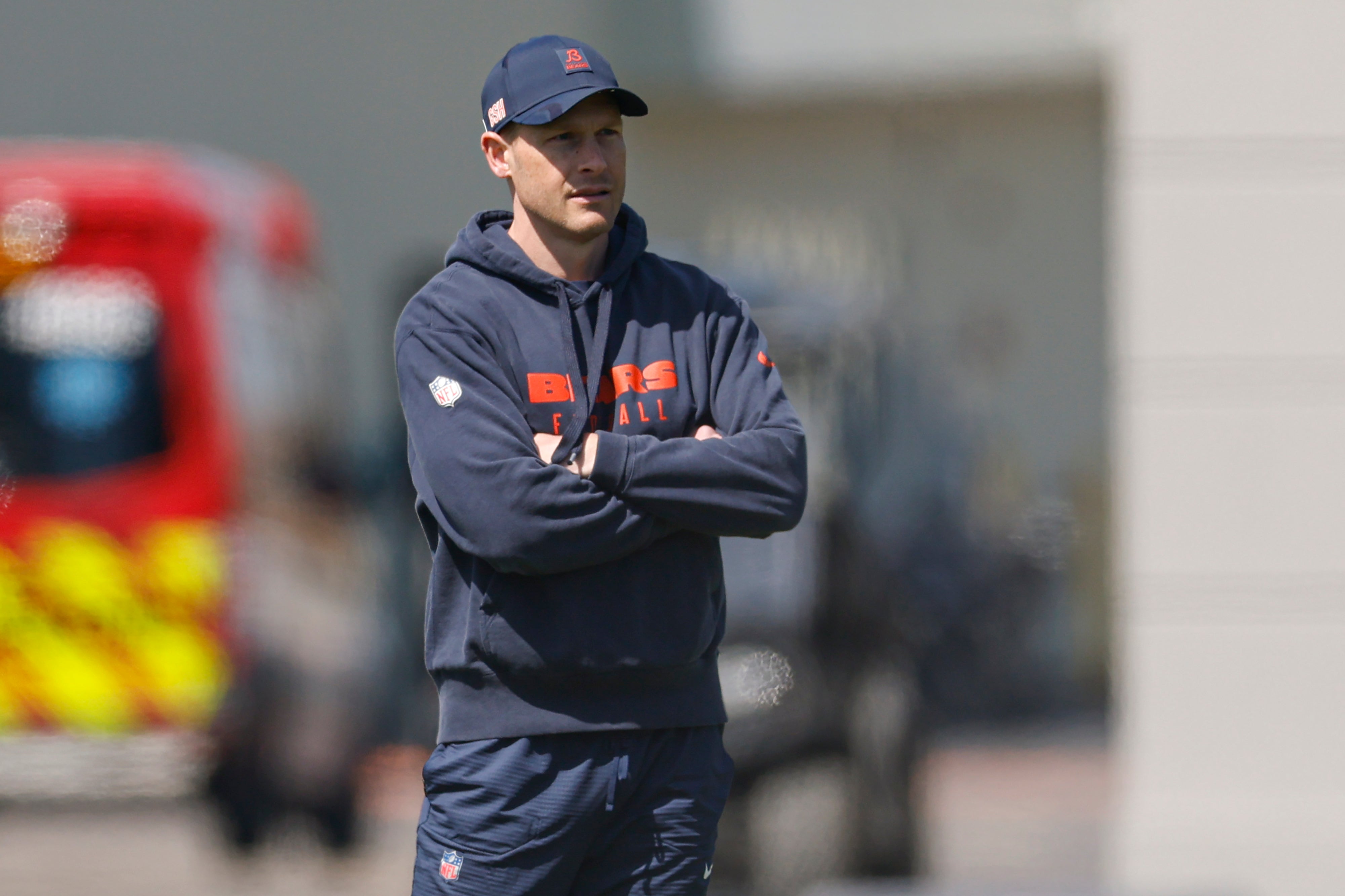 May 9, 2025; Lake Forest, IL, USA; Chicago Bears head coach Ben Johnson (R) looks on during the Rookie Minicamp at Halas Hall.