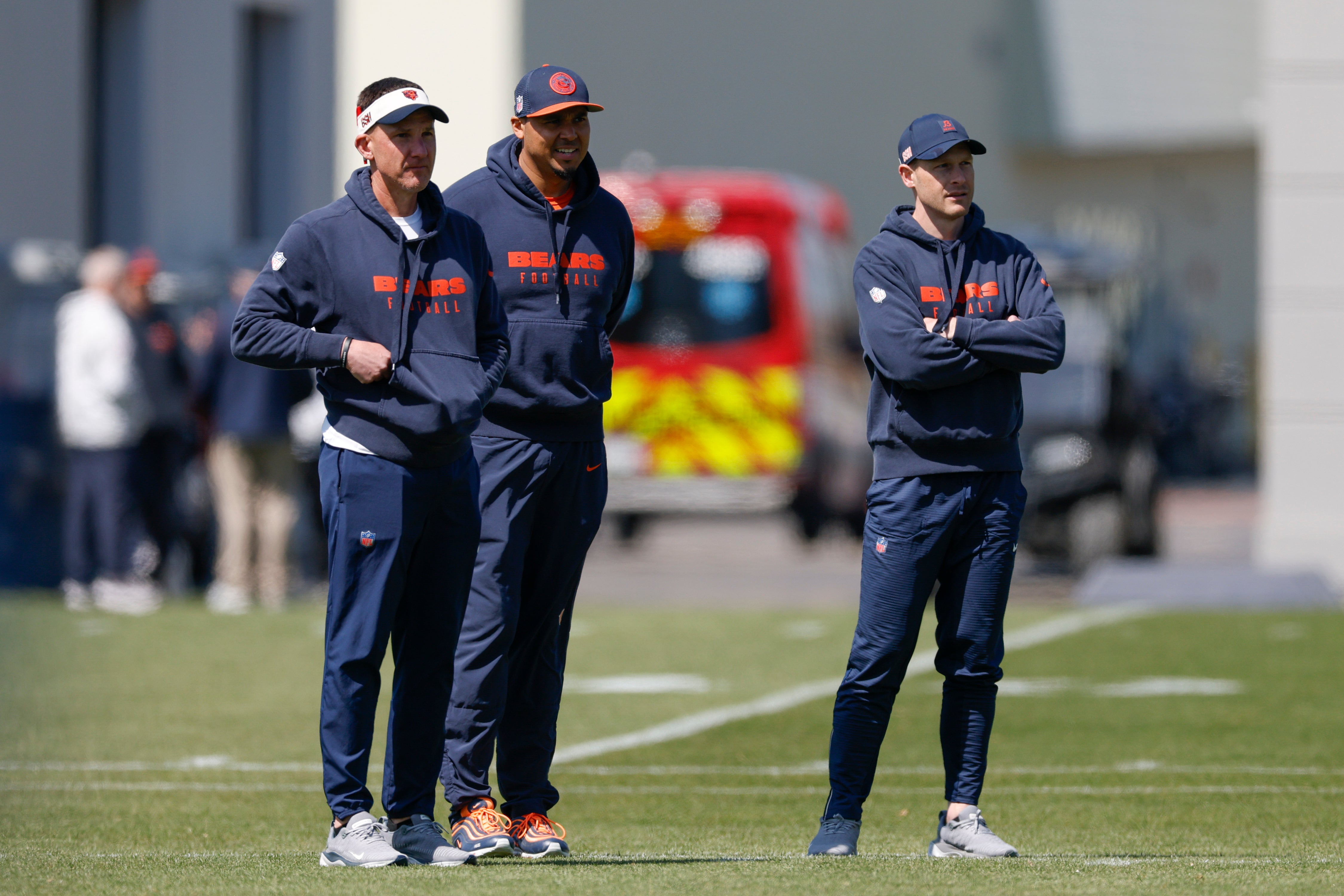 May 9, 2025; Lake Forest, IL, USA; Chicago Bears head coach Ben Johnson (R) looks on during the Rookie Minicamp at Halas Hall.