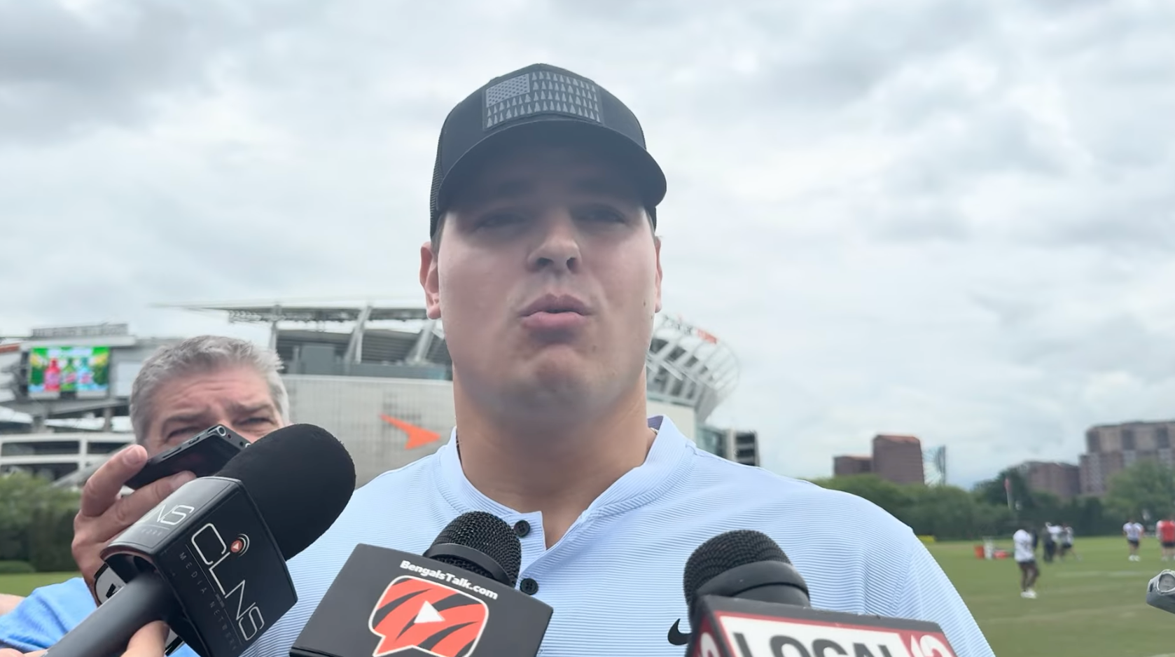 Cincinnati Bengals defensive end Trey Hendrickson speaks to reporters during voluntary workouts on May 13, 2025.