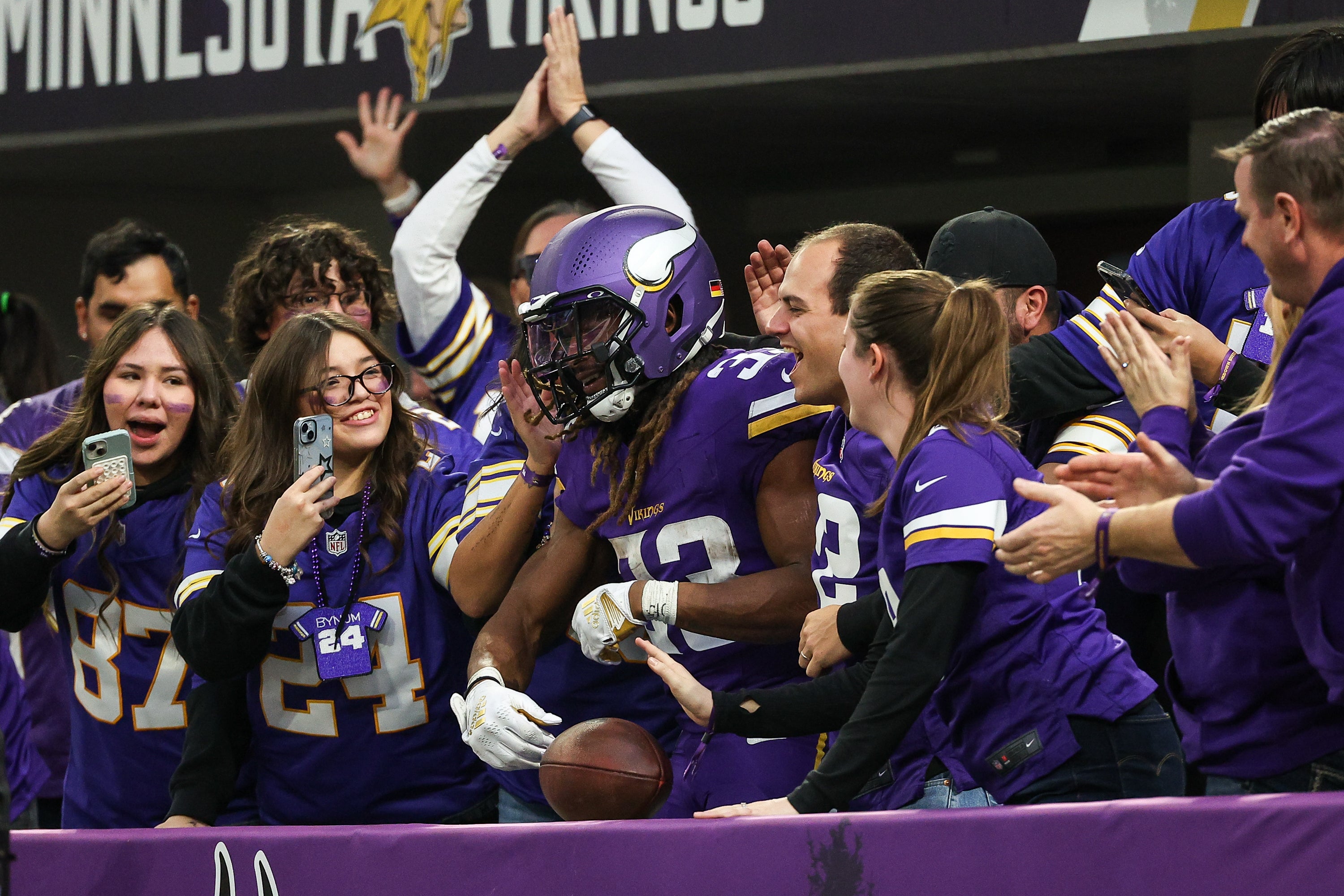Dec 8, 2024; Minneapolis, Minnesota, USA; Minnesota Vikings running back Aaron Jones (33) celebrates his touchdown against the Atlanta Falcons during the fourth quarter at U.S. Bank Stadium.