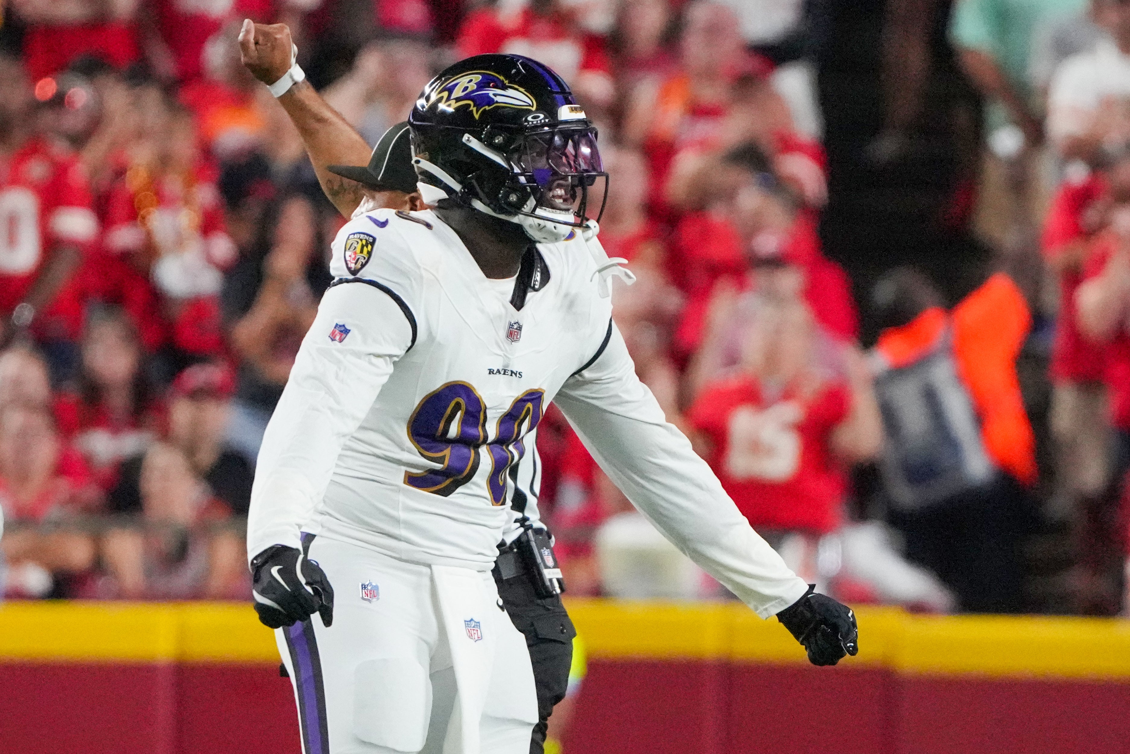 Baltimore Ravens linebacker David Ojabo (90) celebrates after a sack against the Kansas City Chiefs during the first half at GEHA Field at Arrowhead Stadium.