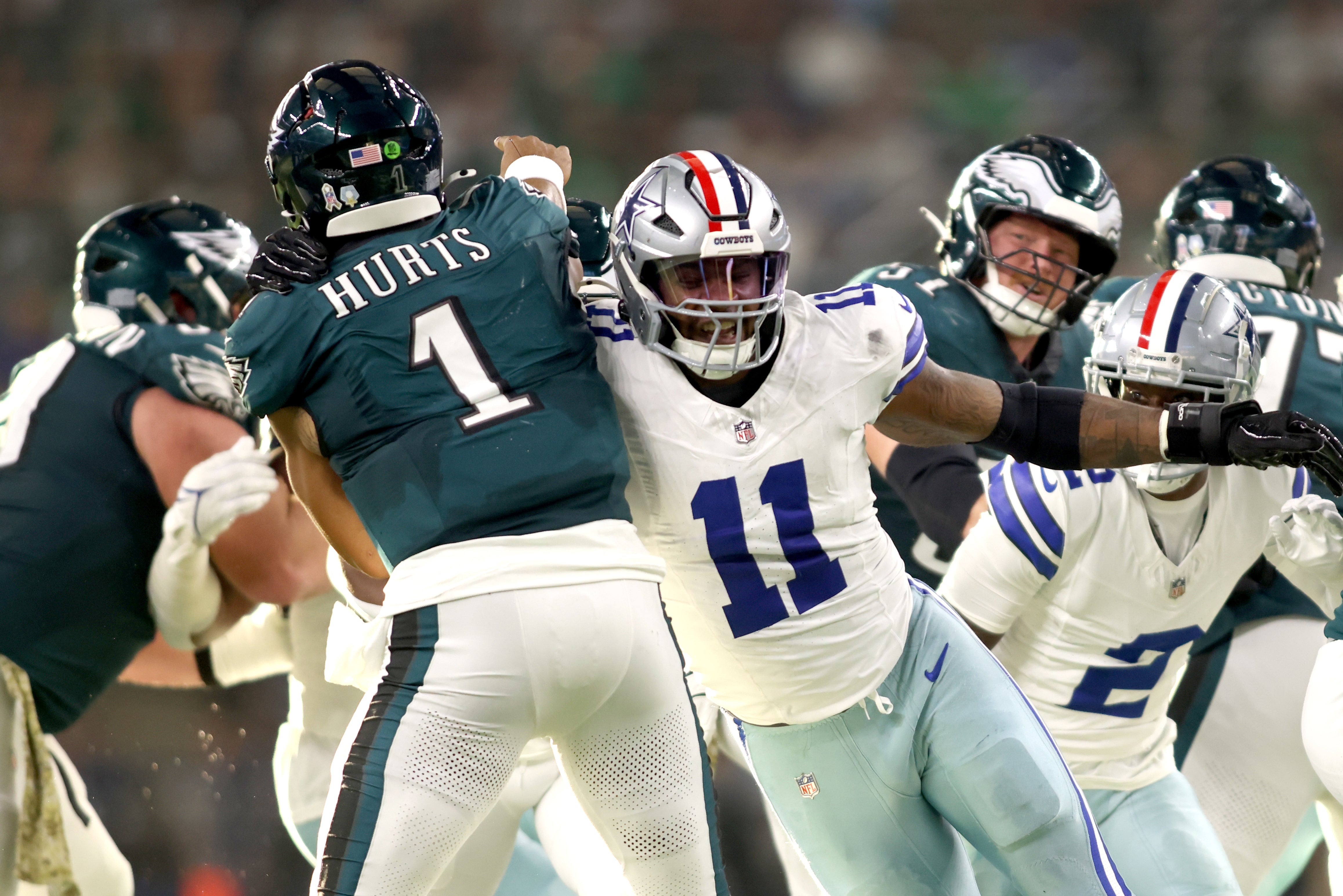 Dallas Cowboys linebacker Micah Parsons (11) rushes the passer in the game against the Philadelphia Eagles at AT&T Stadium.