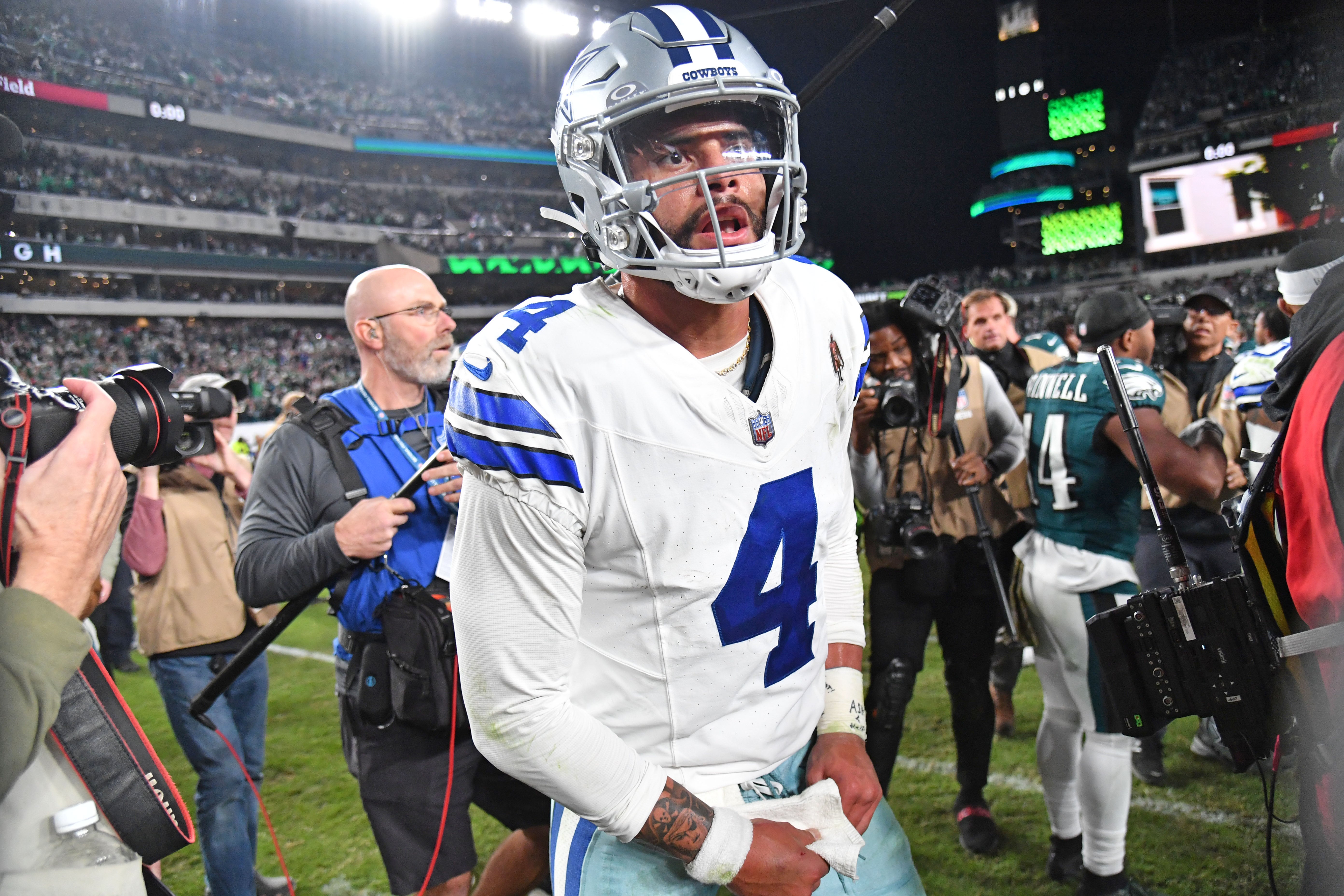 Dallas Cowboys quarterback Dak Prescott (4) on the field after loss to the Philadelphia Eagles at Lincoln Financial Field.