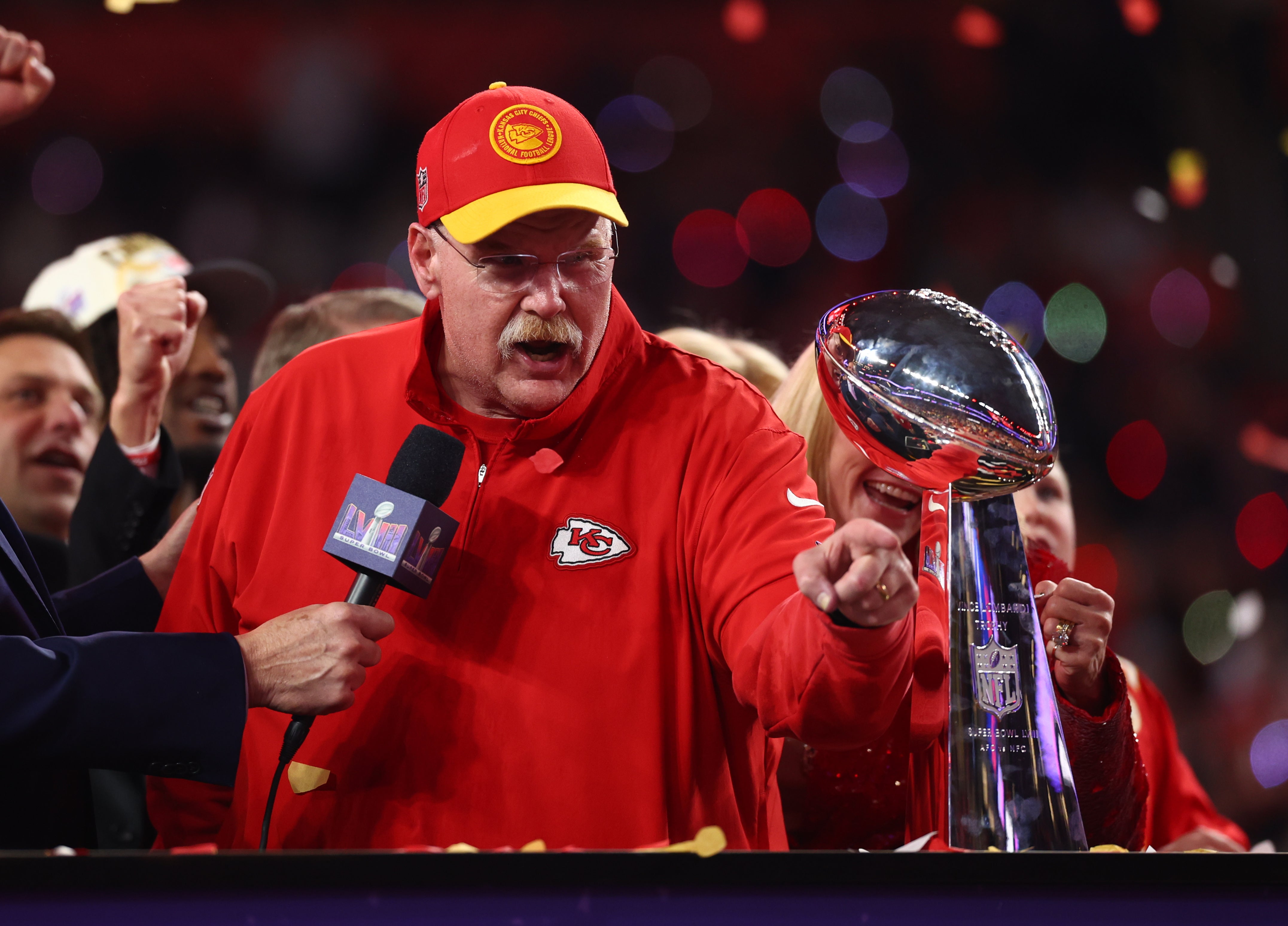 Feb 11, 2024; Paradise, Nevada, USA; Kansas City Chiefs head coach Andy Reid celebrates with the Vince Lombardi Trophy after defeating the San Francisco 49ers in Super Bowl LVIII at Allegiant Stadium.