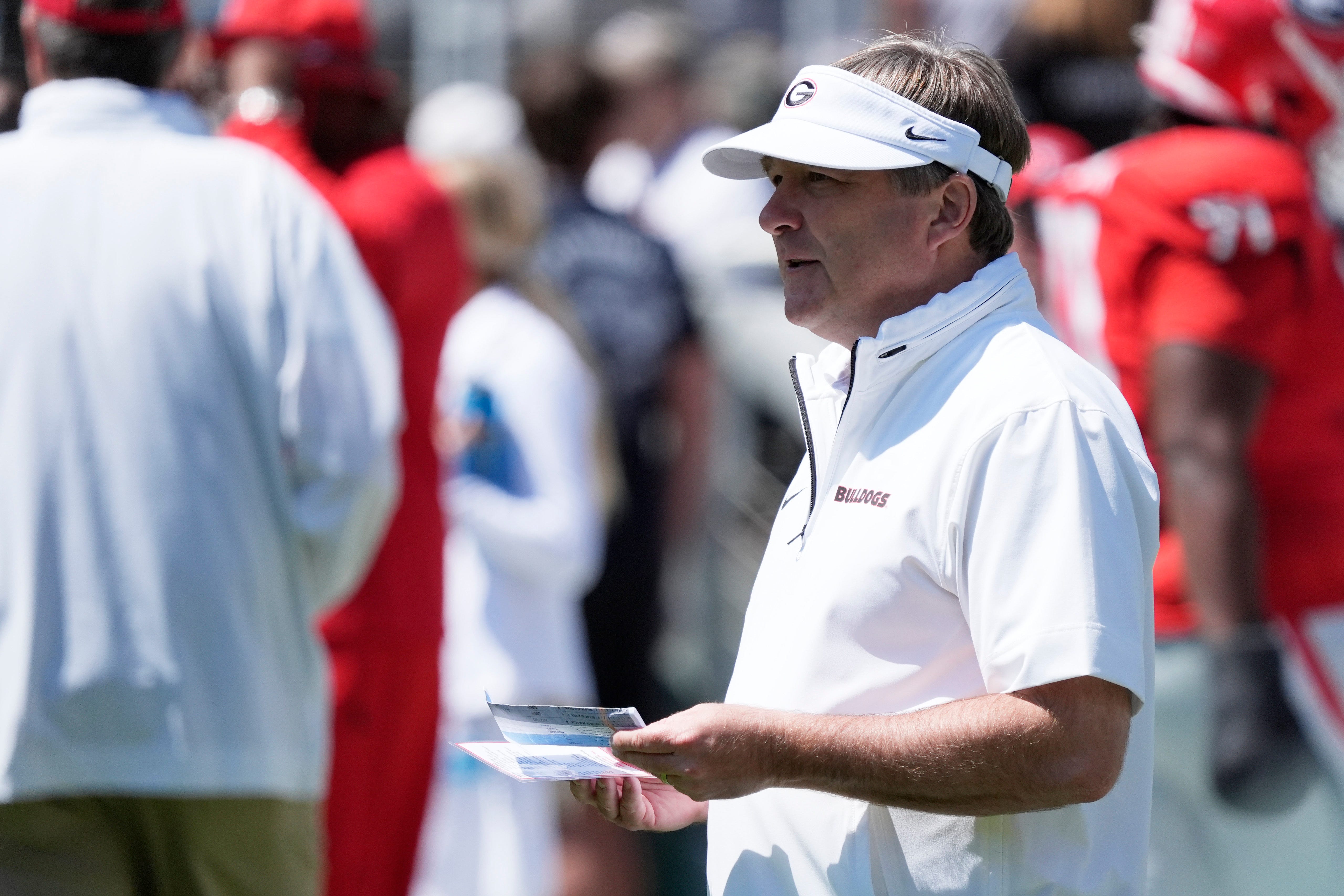 Georgia head coach Kirby Smart looks on during warm ups before the Georgia G-Day spring football game in Athens, Ga., on Saturday, April 12, 2025.