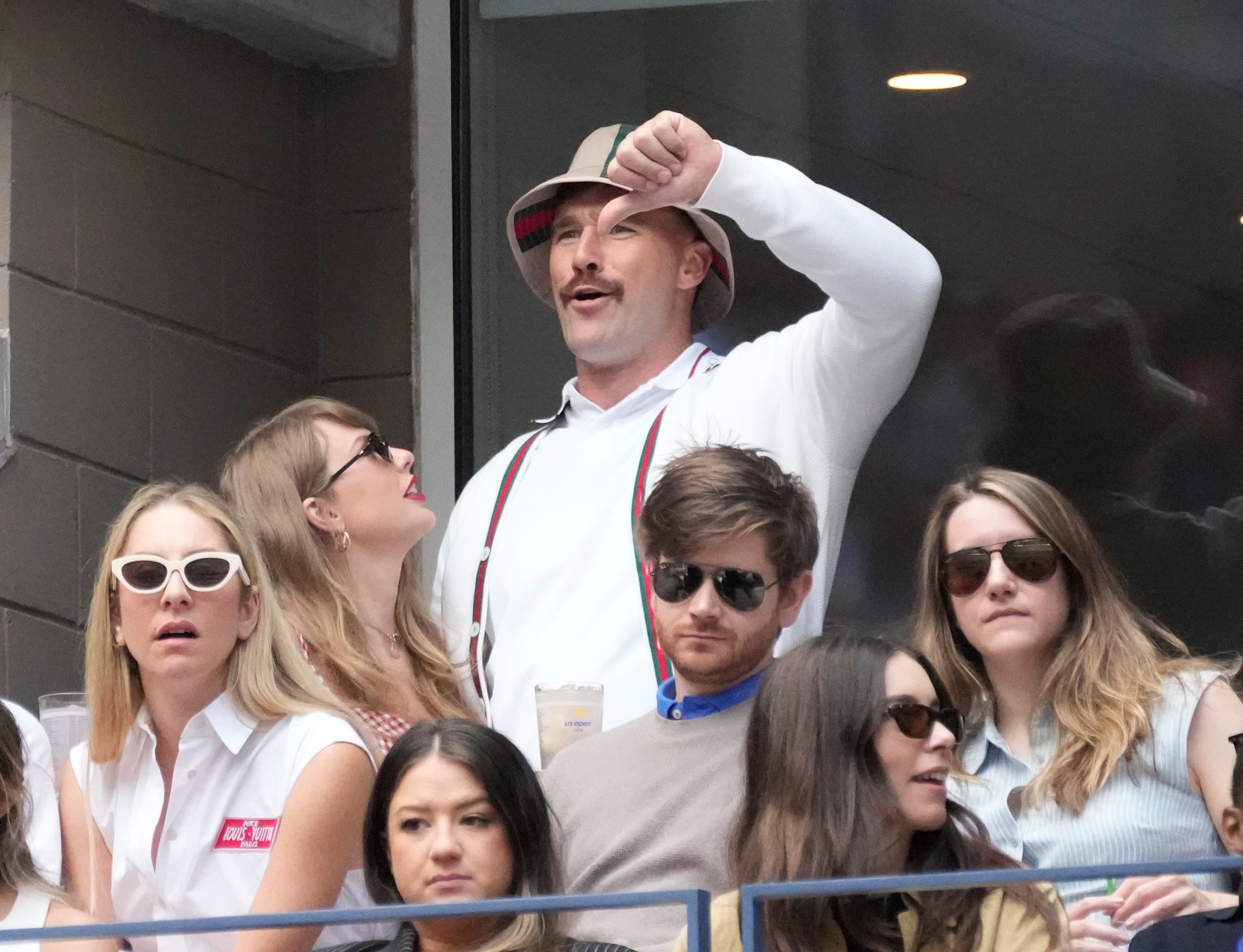 Sep 8, 2024; Flushing, NY, USA; Recording artist Taylor Swift and Kansas City Chiefs tight end Travis Kelce cheer during the men’s singles final of the 2024 U.S. Open tennis tournament at USTA Billie Jean King National Tennis Center.