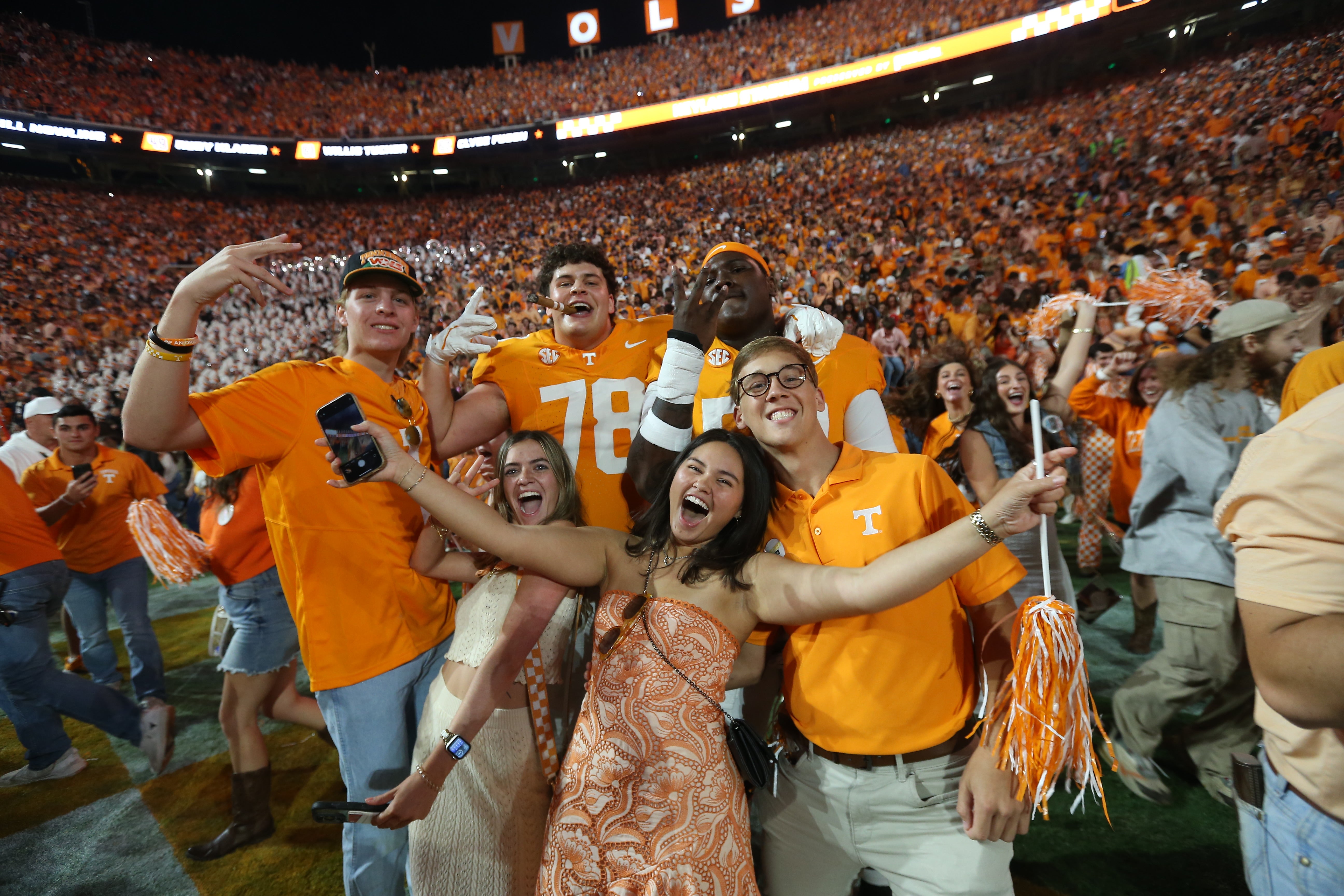 Oct 19, 2024; Knoxville, Tennessee, USA; Tennessee Volunteers offensive lineman Gage Ginther (78) and offensive lineman William Satterwhite (50) celebrate with fans after a victory over the Alabama Crimson Tide at Neyland Stadium.