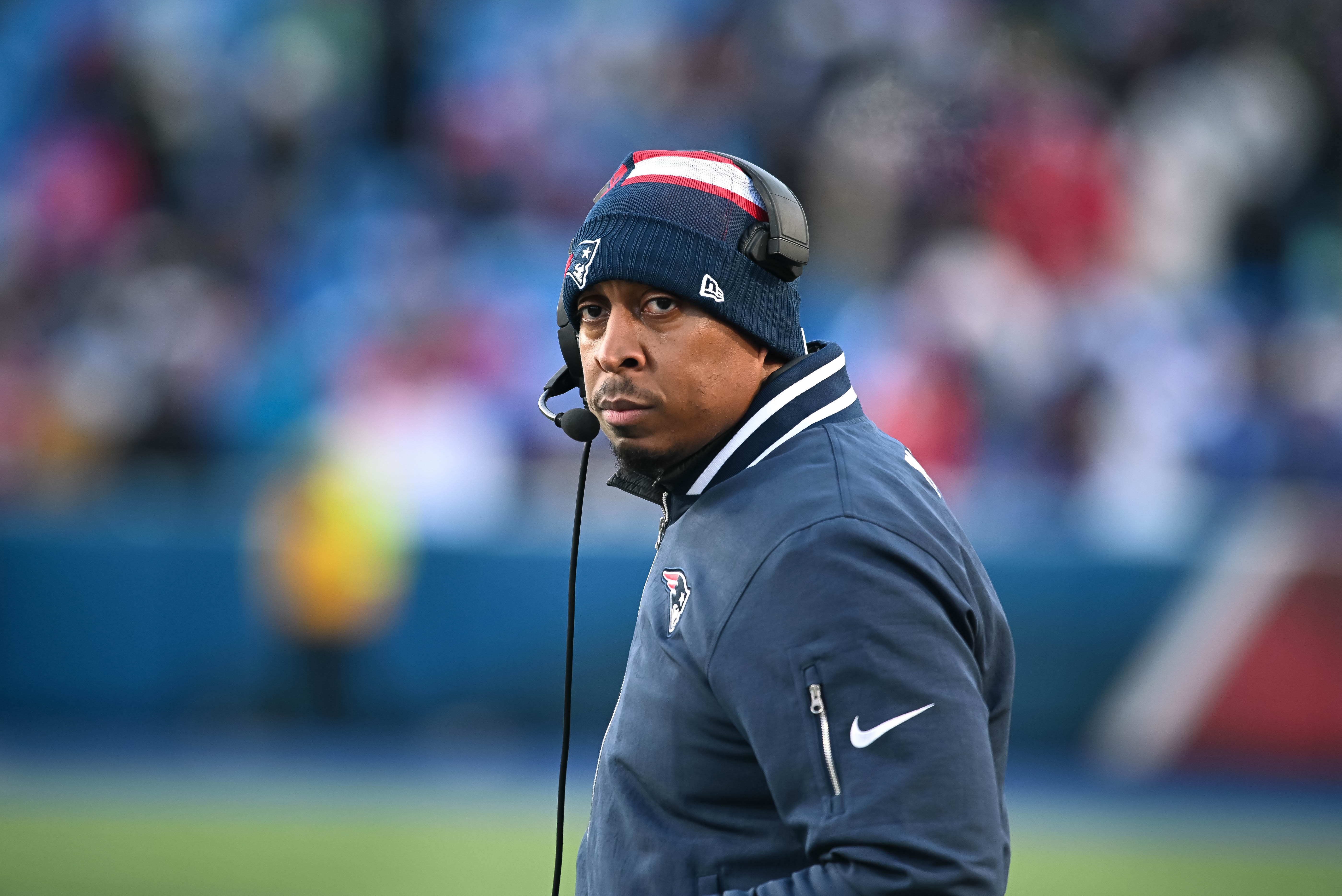 New England Patriots defensive coordinator Demarcus Covington on the field before a game against the Buffalo Bills at Highmark Stadium.