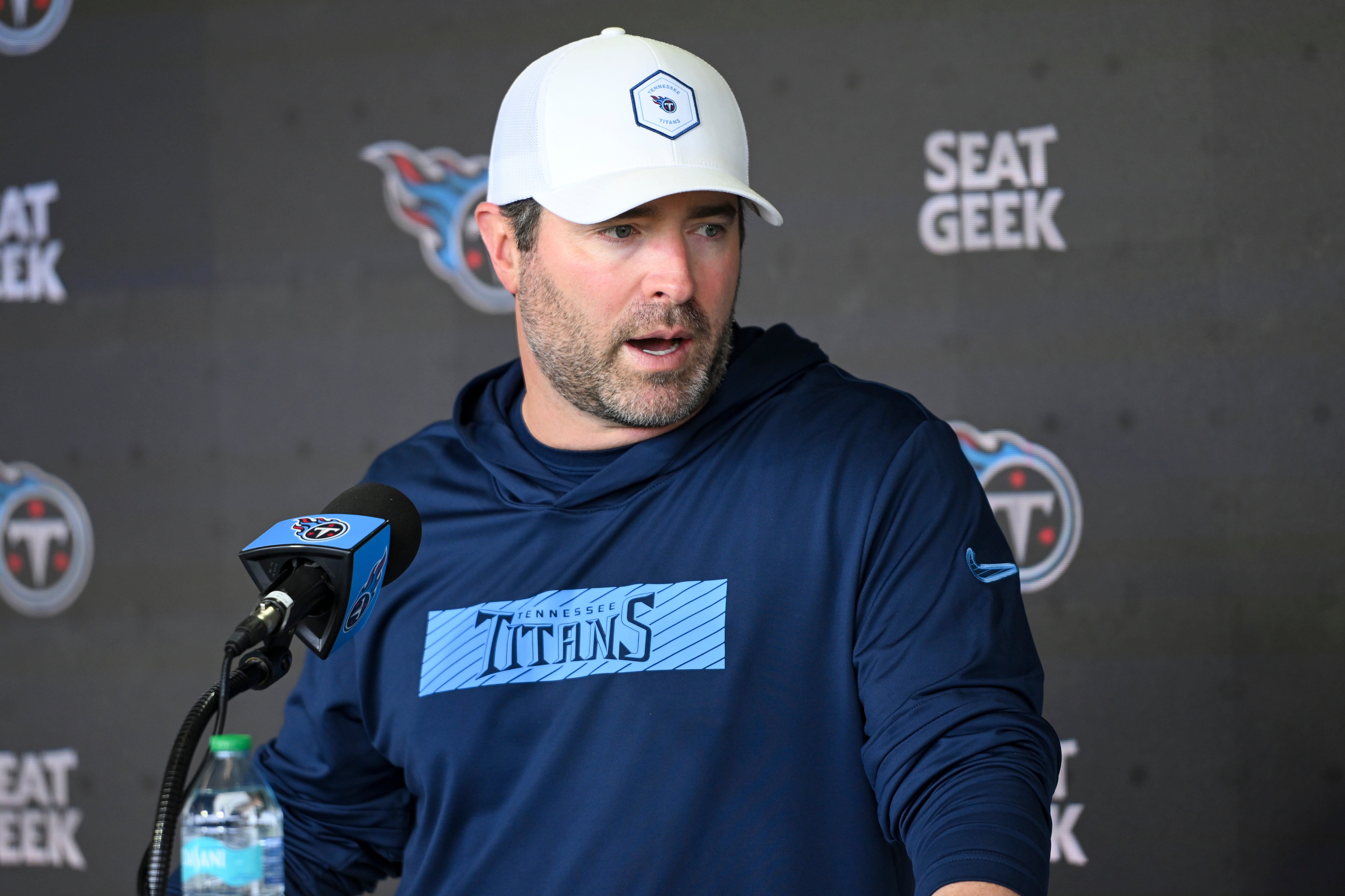 May 10, 2025; Nashville, TN, USA; Tennessee Titans head coach Brian Callahan talks with reporters just prior to the start of rookie training camp at Saint Thomas Sports ParkTennessee. Mandatory Credit: Steve Roberts-Imagn Images