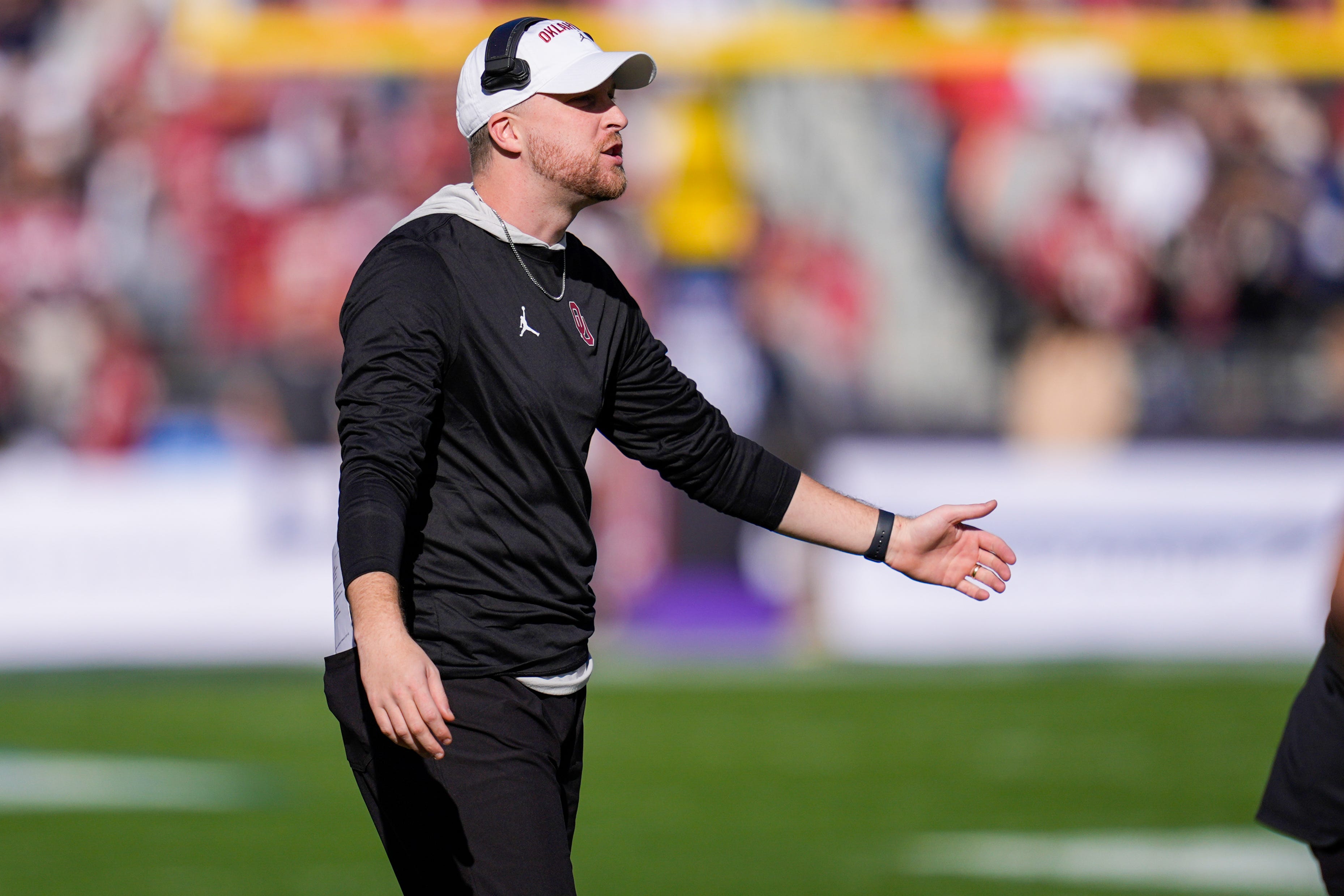 Oklahoma offensive coordinator Ben Arbuckle celebrates during the Armed Forces Bowl football game between the University of Oklahoma Sooners (OU) and the Navy Midshipmen at Amon G. Carter Stadium in Fort Worth, Texas, Friday, Dec. 27, 2024. Navy won 21-20.