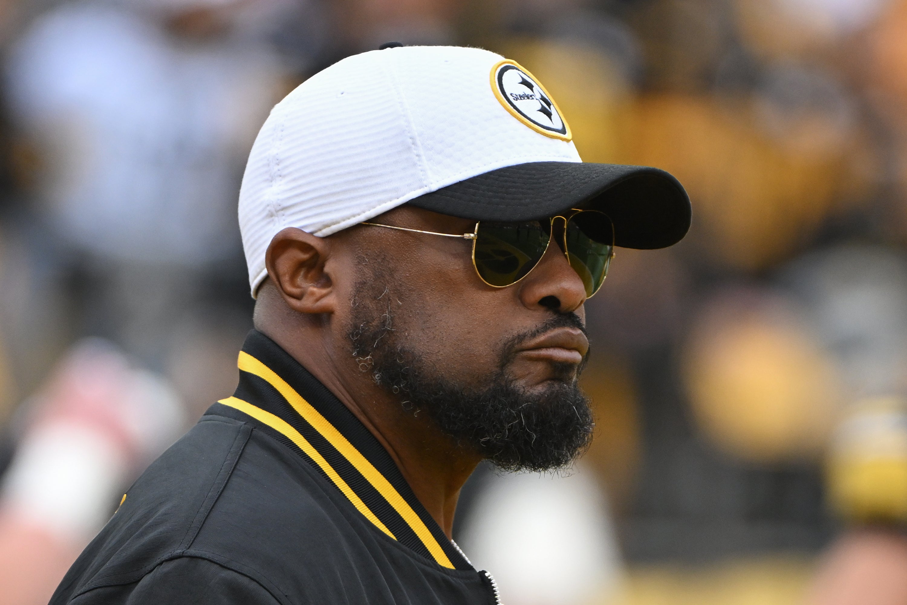 Dec 25, 2024; Pittsburgh, Pennsylvania, USA; Pittsburgh Steelers head coach Mike Tomlin watches warm ups against the Kansas City Chiefs at Acrisure Stadium.