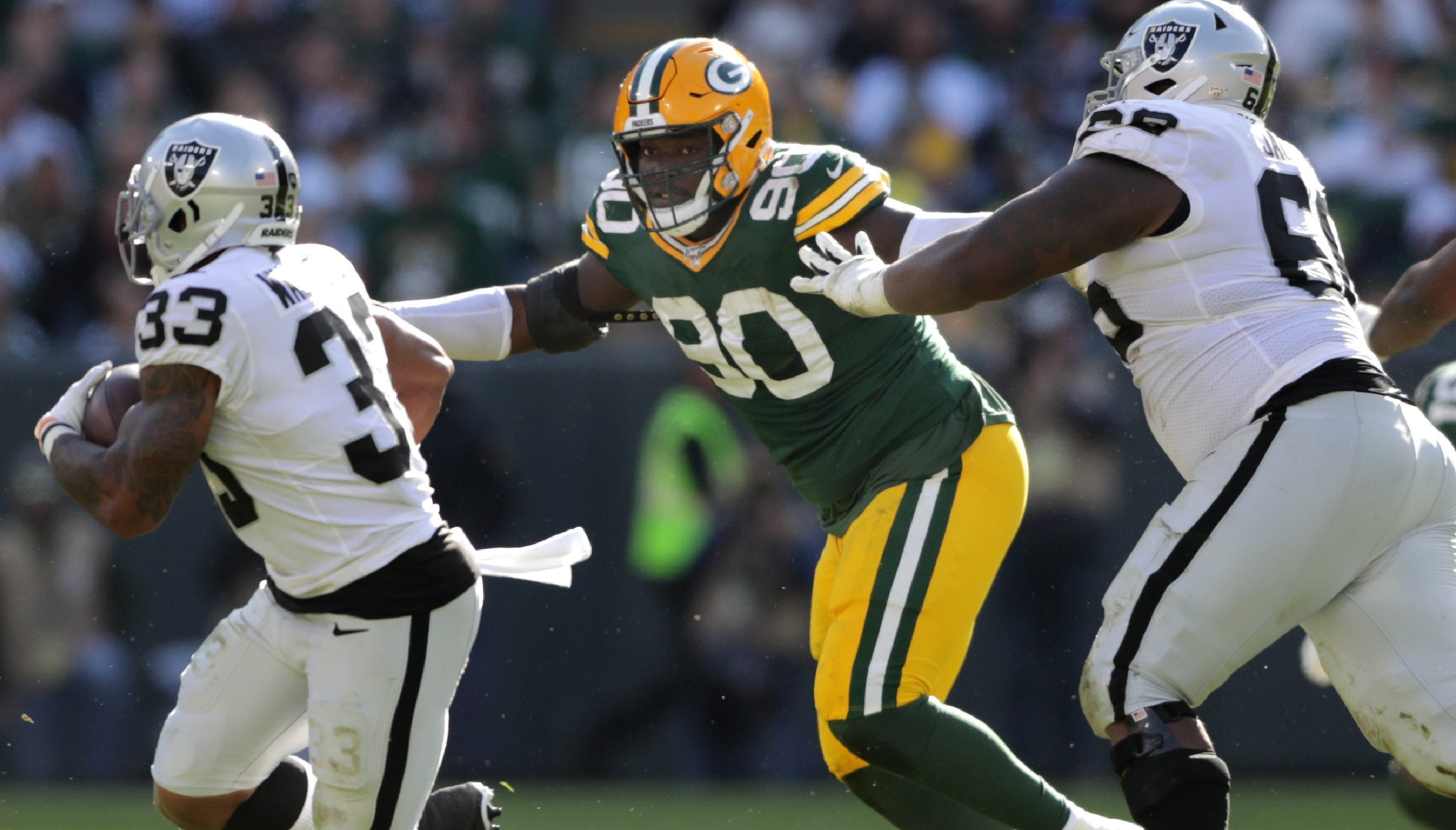 Green Bay Packers defensive tackle Montravius Adams (90) against the Oakland Raiders during their football game Sunday, October 20, 2019, at Lambeau Field in Green Bay, Wis.