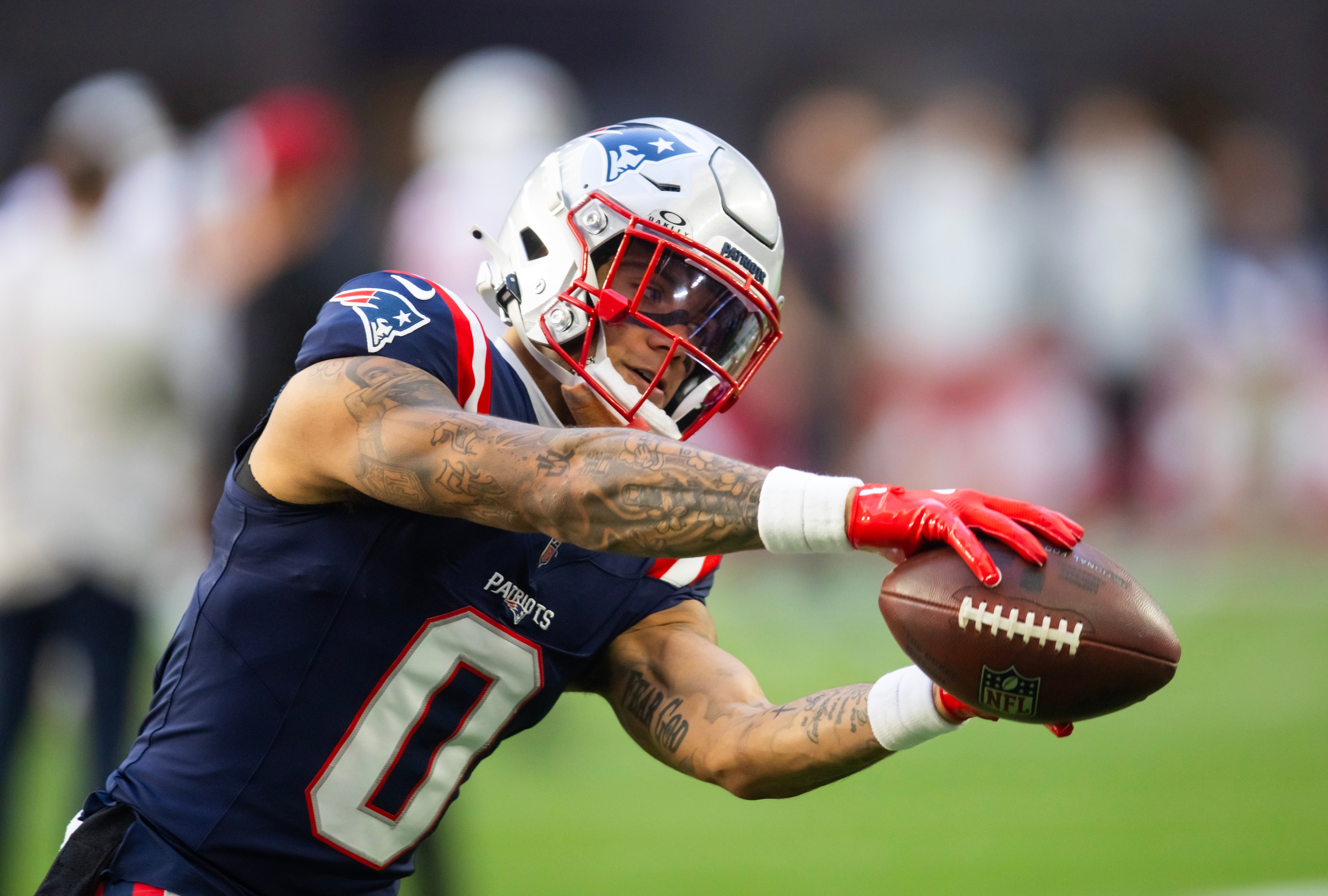 Dec 15, 2024; Glendale, Arizona, USA; New England Patriots cornerback Christian Gonzalez (0) against the Arizona Cardinals at State Farm Stadium.