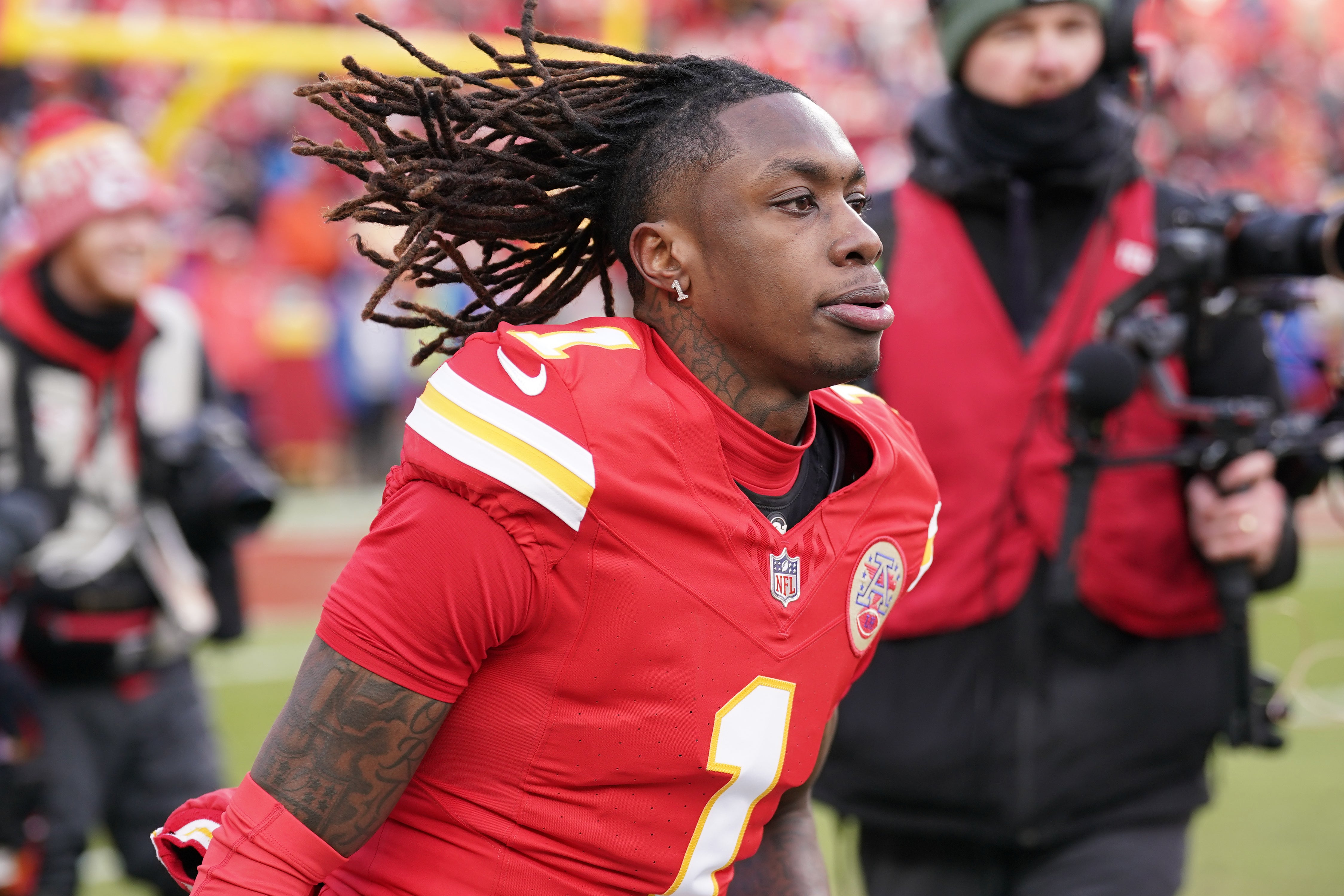 Jan 18, 2025; Kansas City, Missouri, USA; Kansas City Chiefs wide receiver Xavier Worthy (1) reacts before a 2025 AFC divisional round game against the Houston Texans at GEHA Field at Arrowhead Stadium.